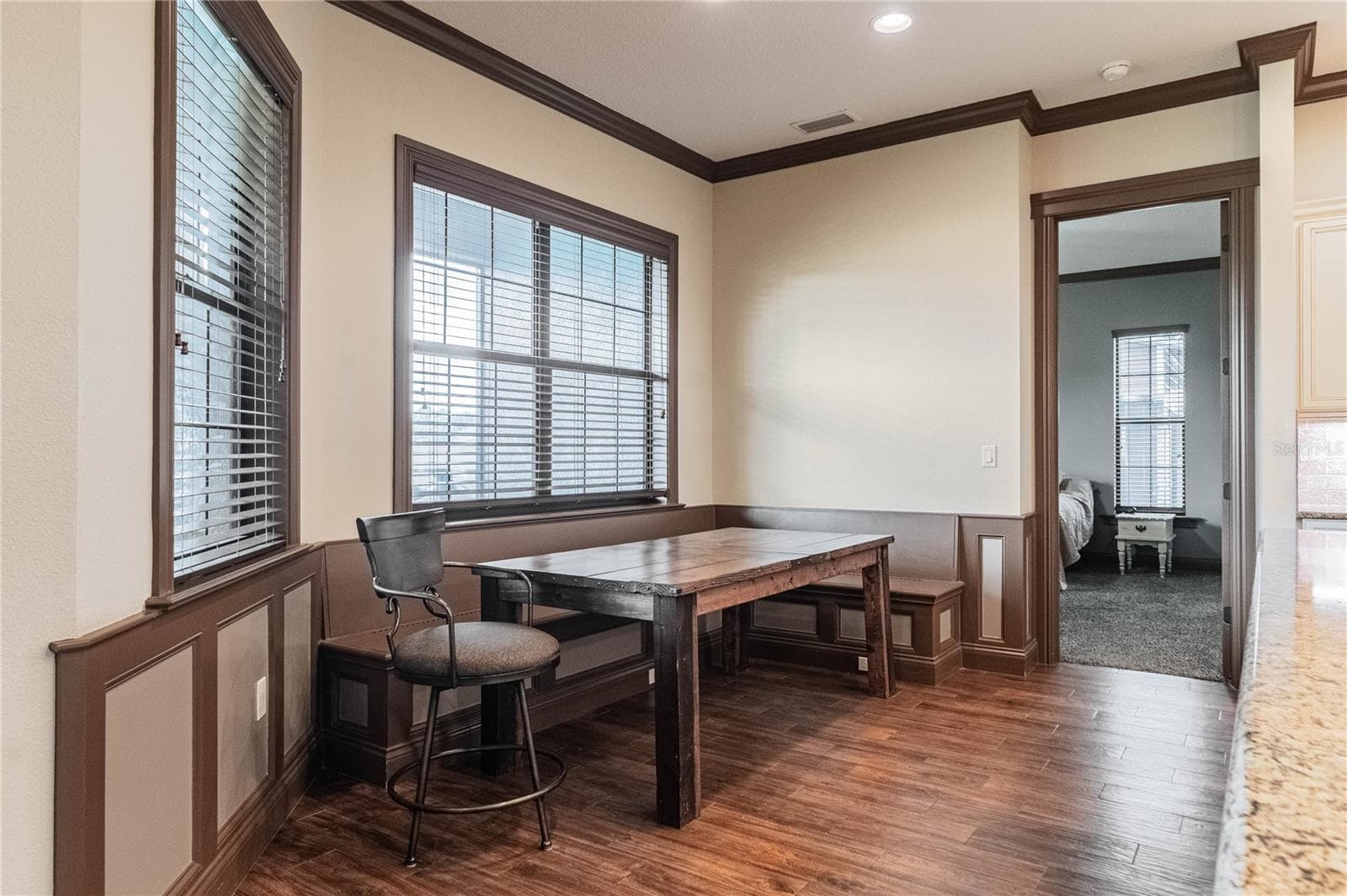 Dinette area with built in storage bench - 3910 KNIGHTS STATION RD, LAKELAND