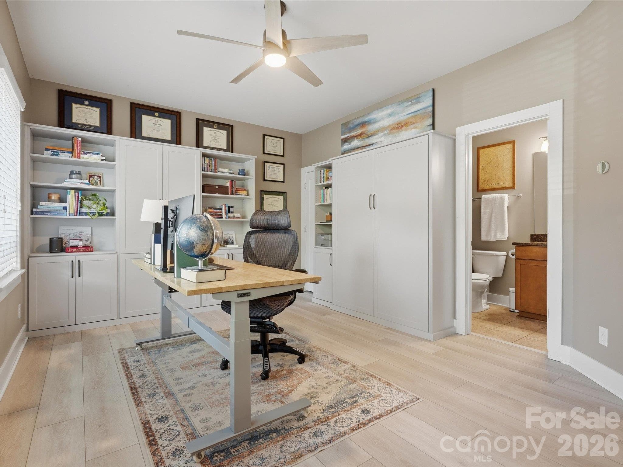 lower level guest space- attached murphy bed and shelving - 1806 Sunnyside Avenue, Charlotte