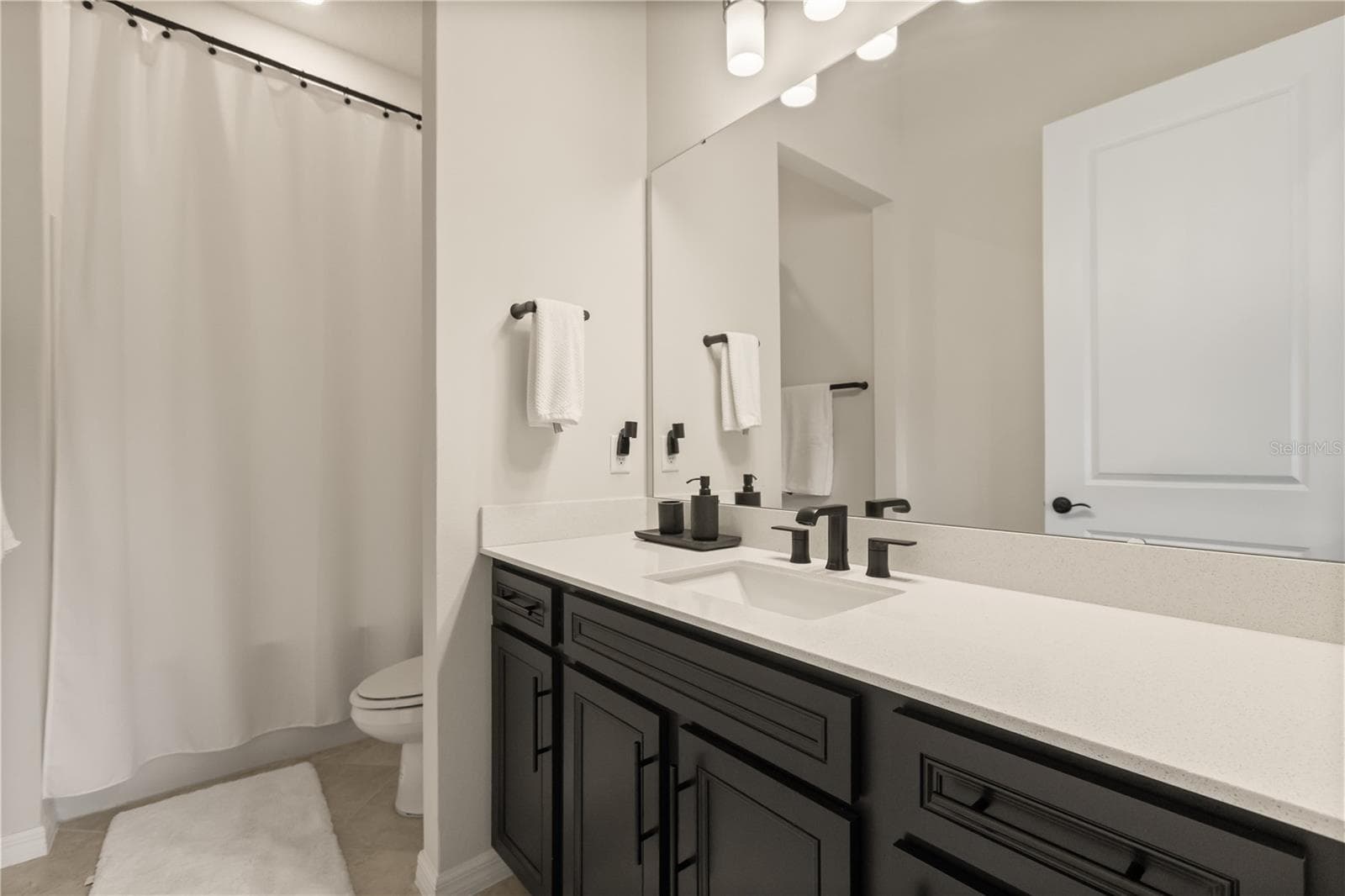 Bathroom for bedroom 1 - 4348 SUNSET PRESERVE BLVD, ORLANDO
