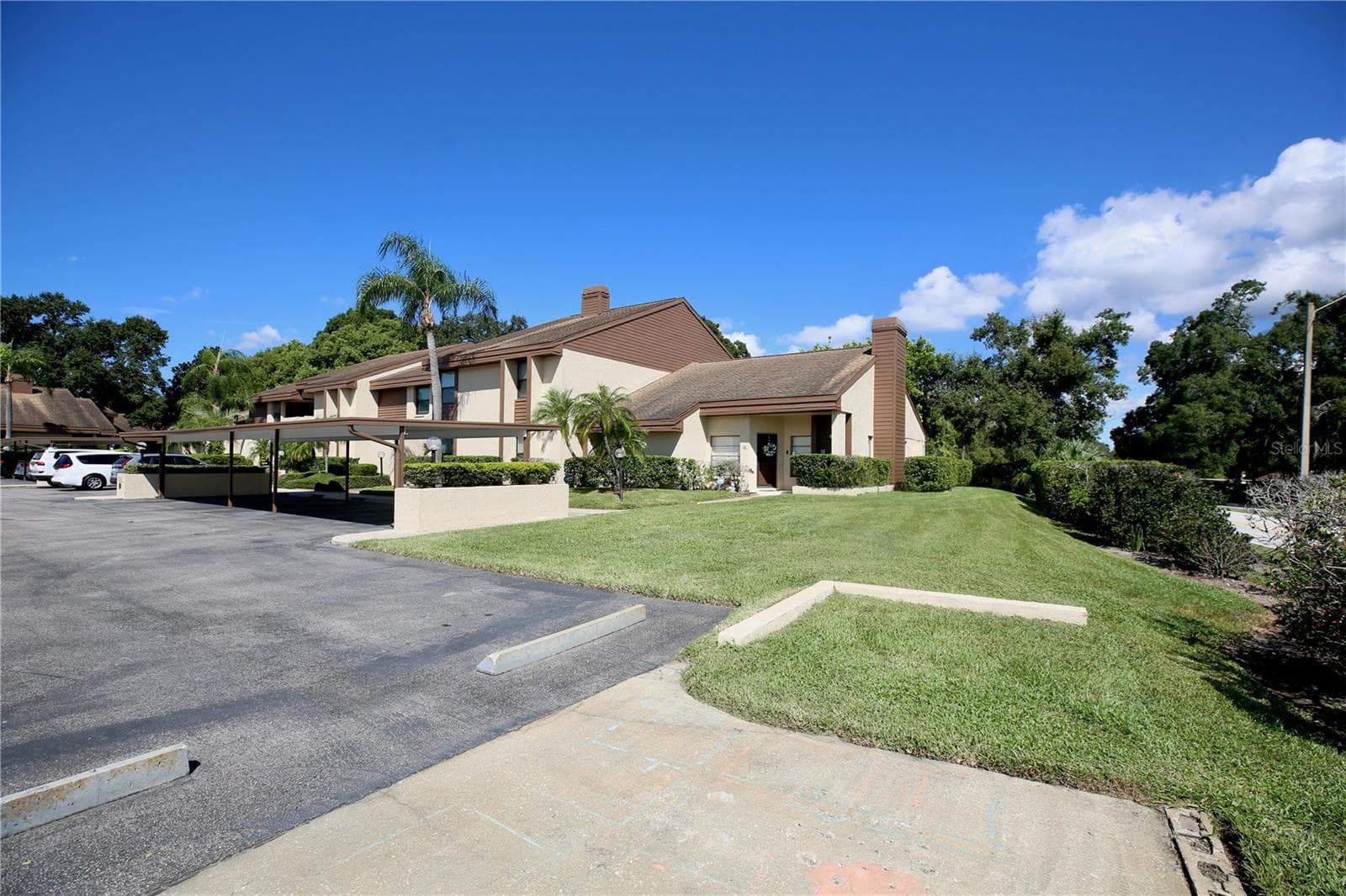 assigned space directly in front of the unit - 3540 COUNTRYBROOK LN #16, PALM HARBOR