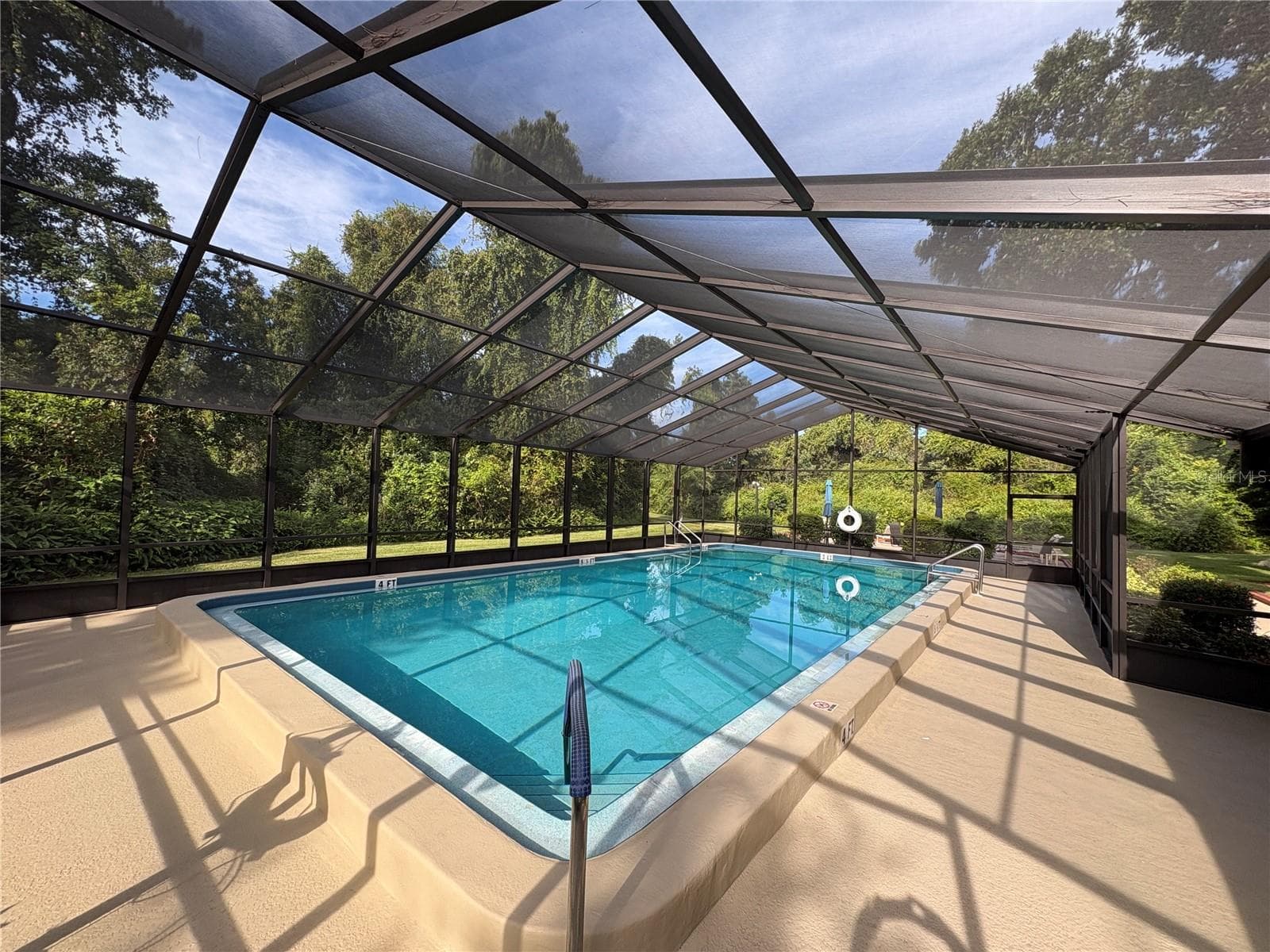 screened in community pool - 3540 COUNTRYBROOK LN #16, PALM HARBOR