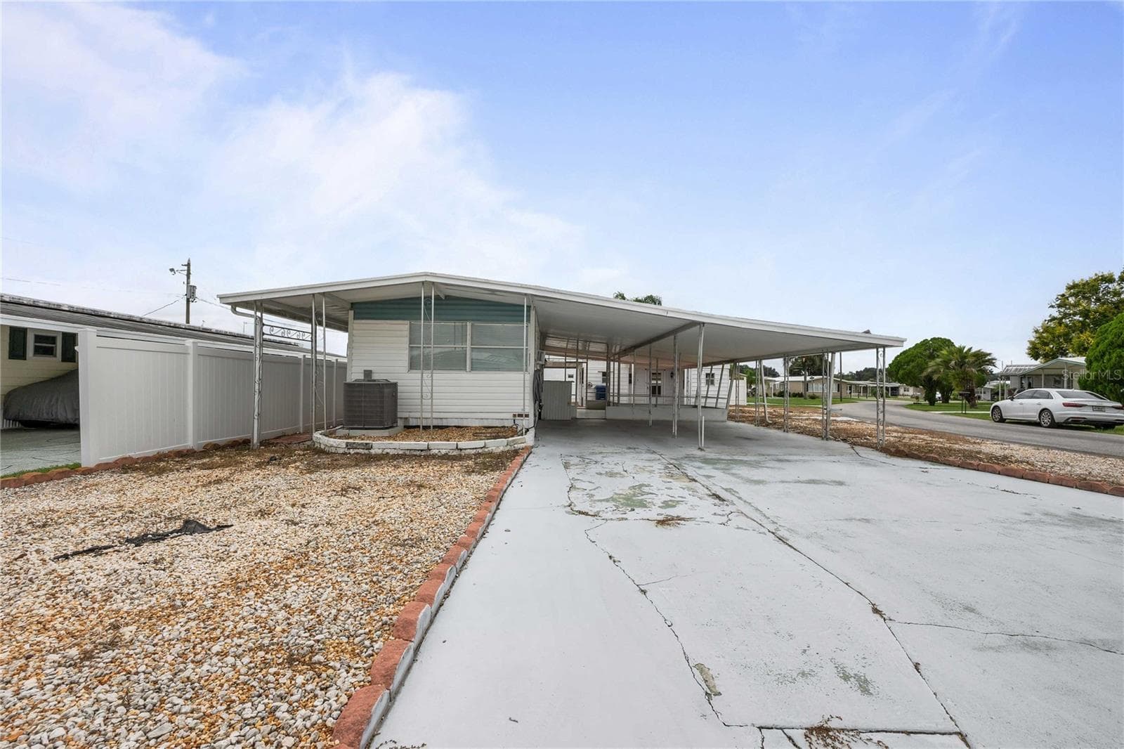 Mobile Home at 37234 CAROL AVE, ZEPHYRHILLS, photo 2 of 43