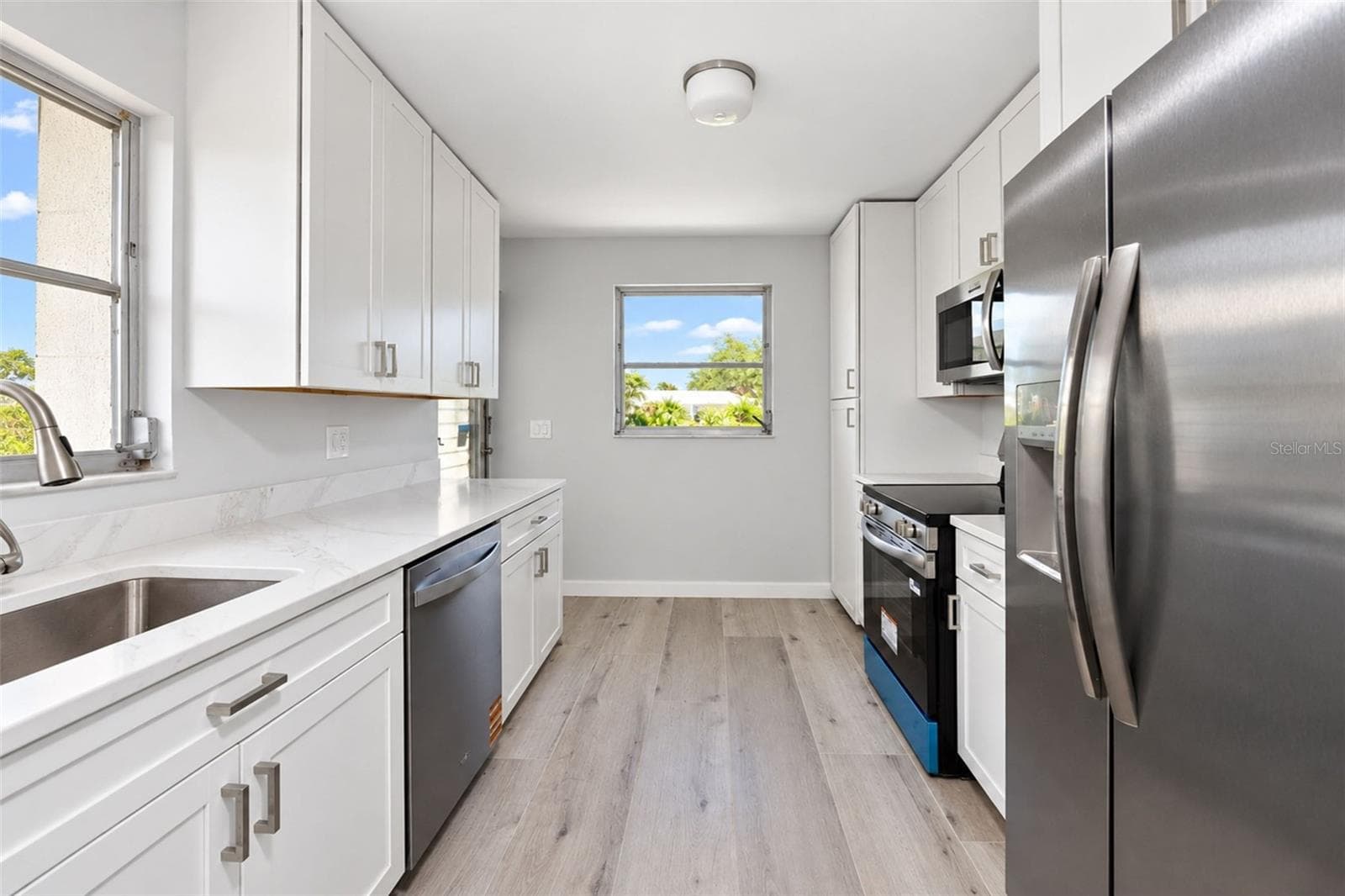 NEW Kitchen with qurtz counters an stainless steel appliance package. - 206 BRIGANTINE WAY #206, NOKOMIS