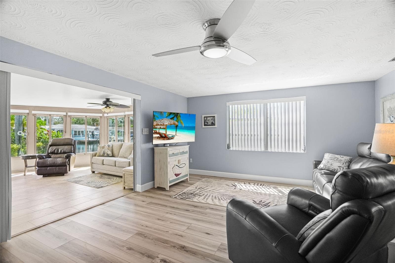 Living room opens to bonus room - 4916 POMPANO DR, NEW PORT RICHEY