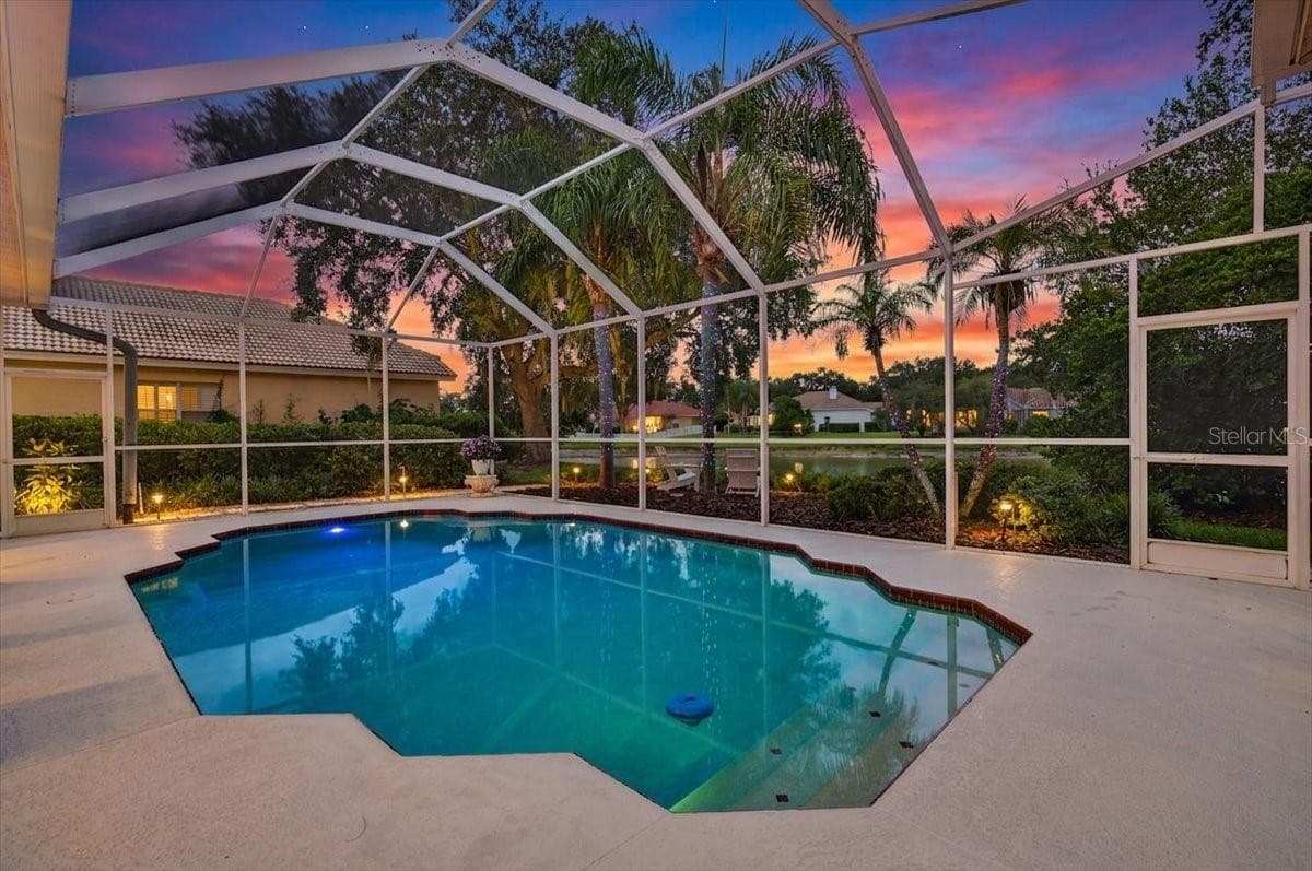 Single Family Residence at 9101 WOODRIDGE RUN DR, TAMPA, photo 2 of 100
