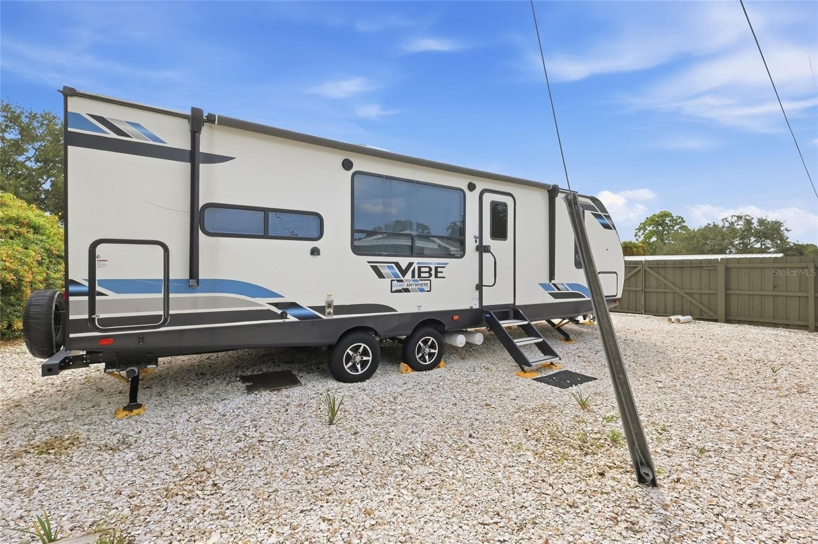 access gate for RV or camper storage, complete with 50 amp service and drain for a full RV hookup - 5055 LAHAINA DR, SARASOTA