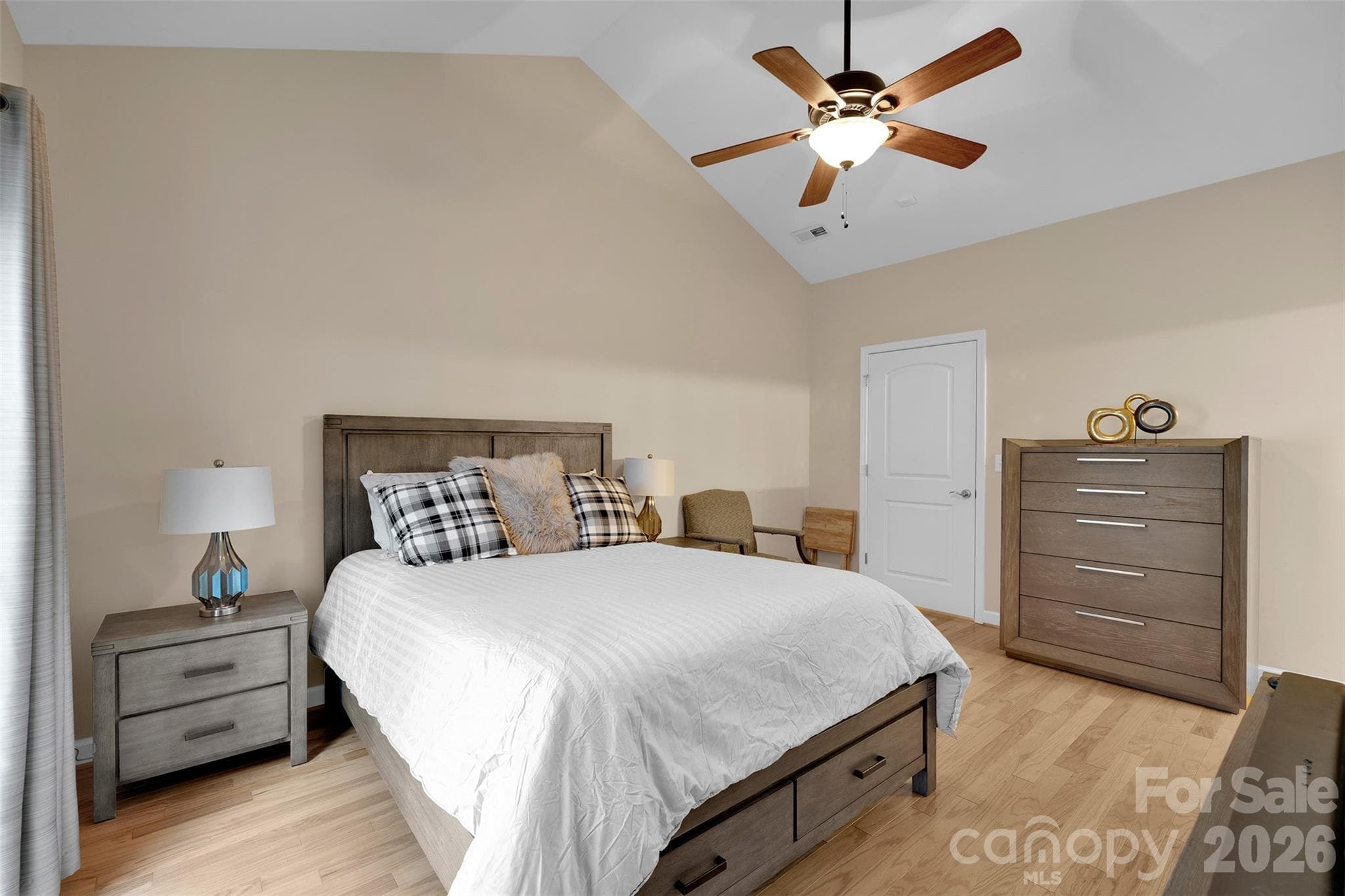 Primary bedroom with sliding door that leads to the fenced in patio. - 4767 Polo Gate Boulevard, Charlotte