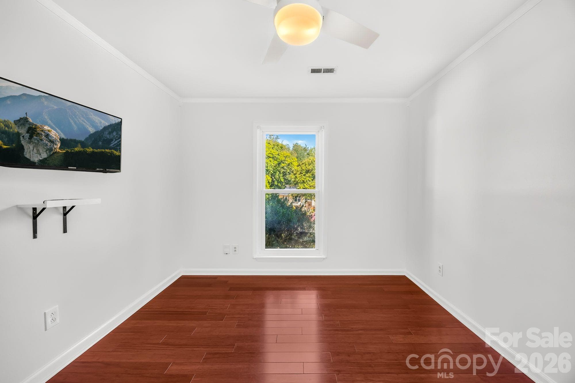 Third bedroom with room for guests or a home office in a one-level East Charlotte home - 4900 Cricklewood Lane, Charlotte