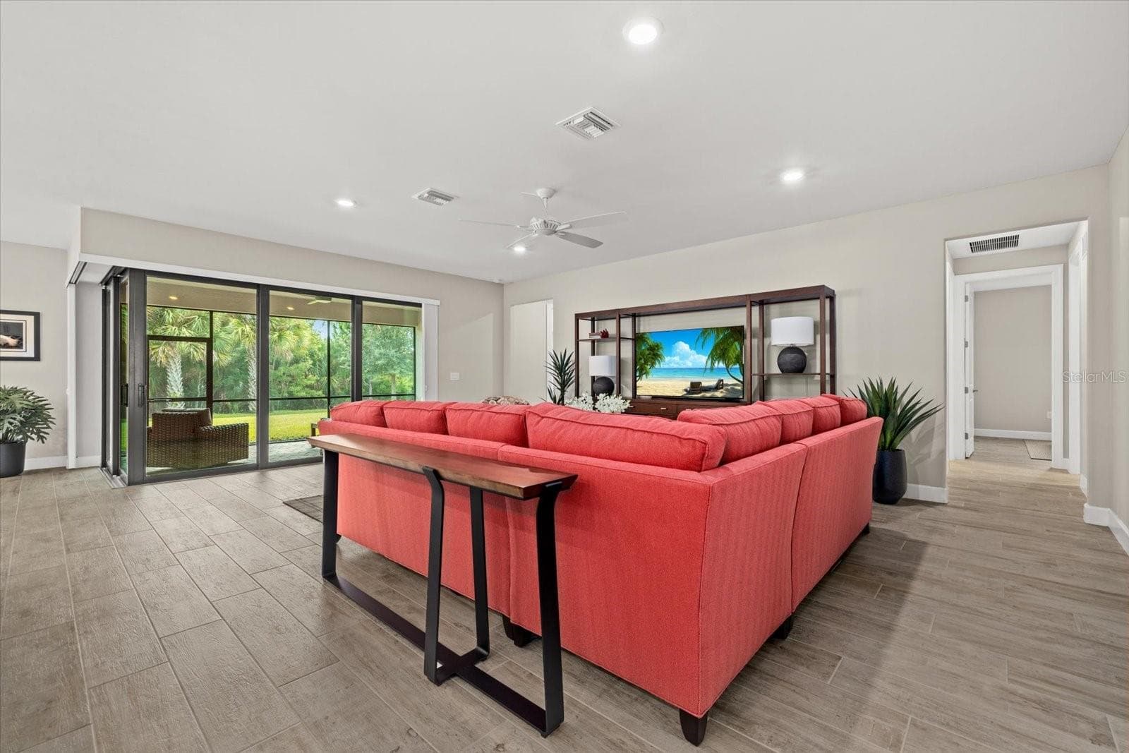 Living Room looking into the Screened Covered Lanai - 12446 MARSH POINTE RD, SARASOTA