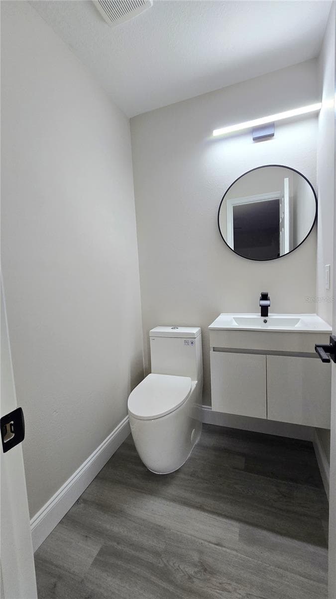 Half bath in Bedroom 1 - 605 JAMESON DR, ORANGE CITY