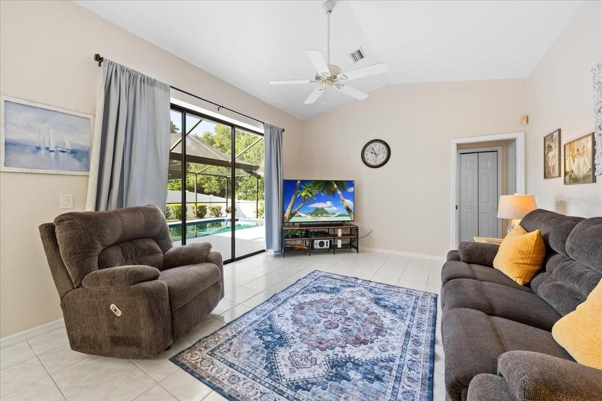 Family Room with Pool View - 2656 SADDLEWOOD LN, PALM HARBOR