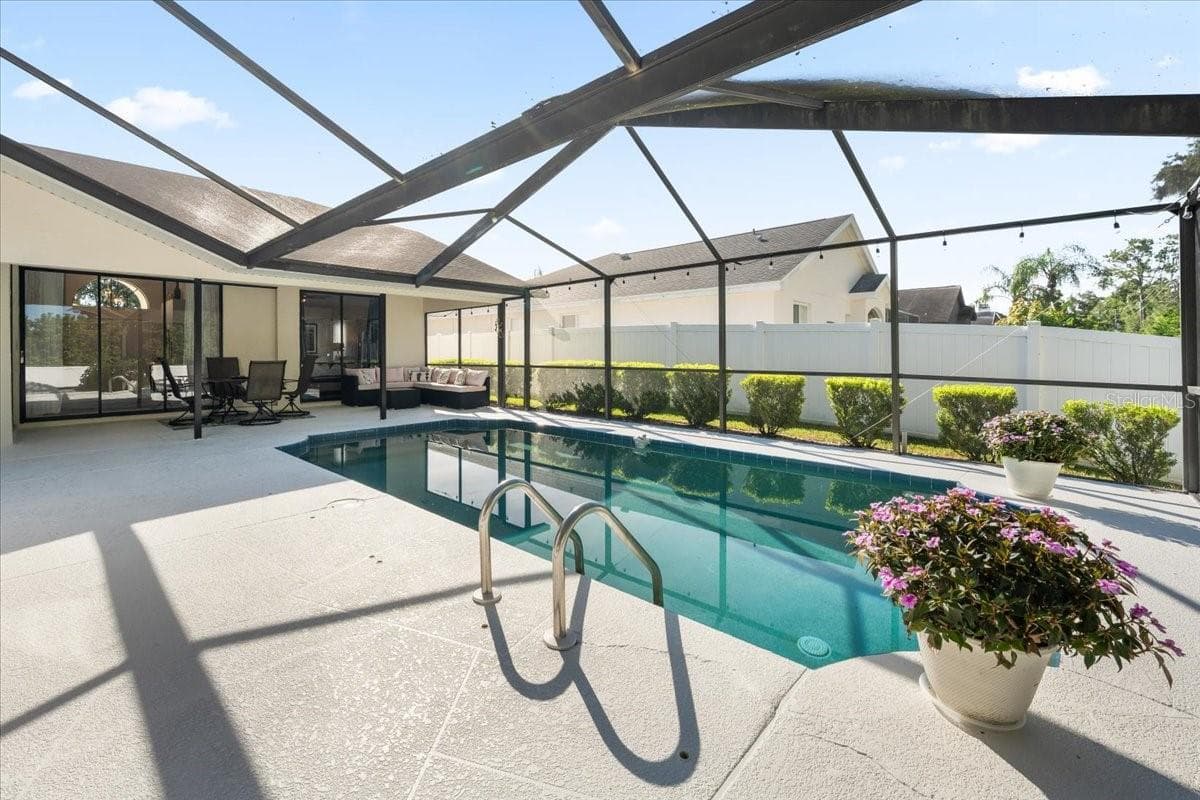 Swimming Pool and Side Yard - 2656 SADDLEWOOD LN, PALM HARBOR
