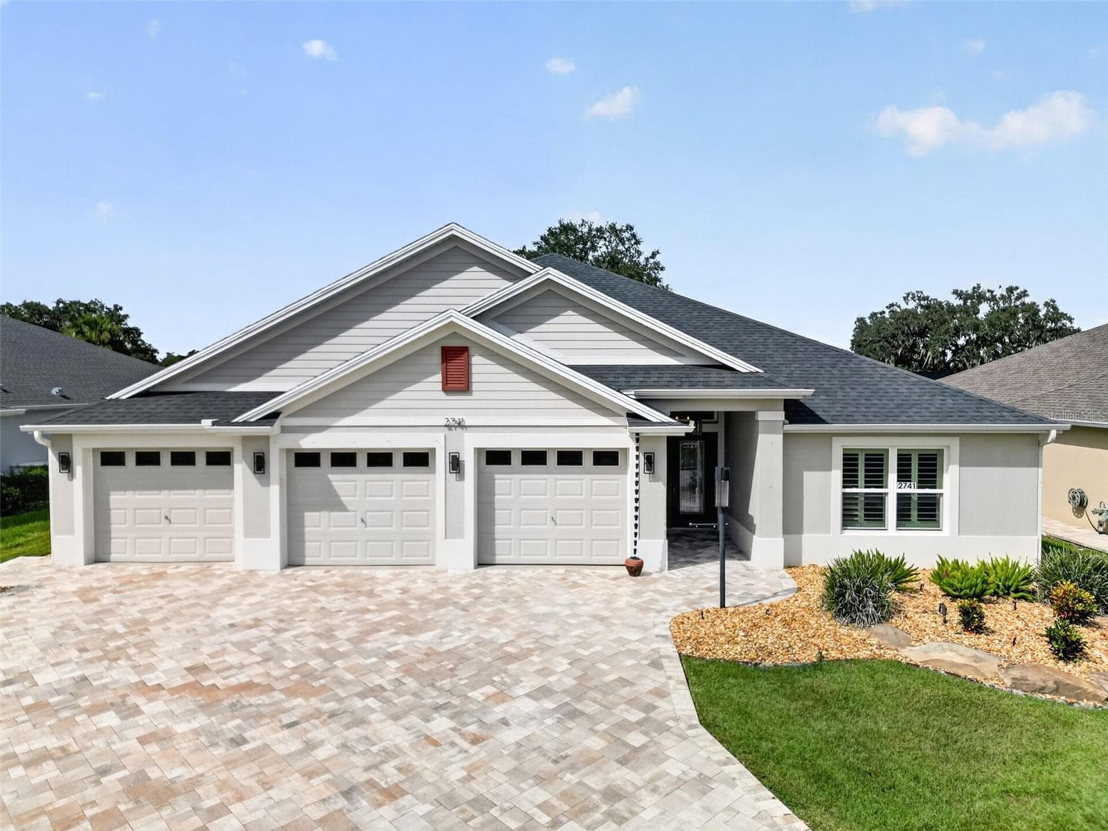 3 Stall Garage with a large driveway - 2741 DUNHAM DR, THE VILLAGES