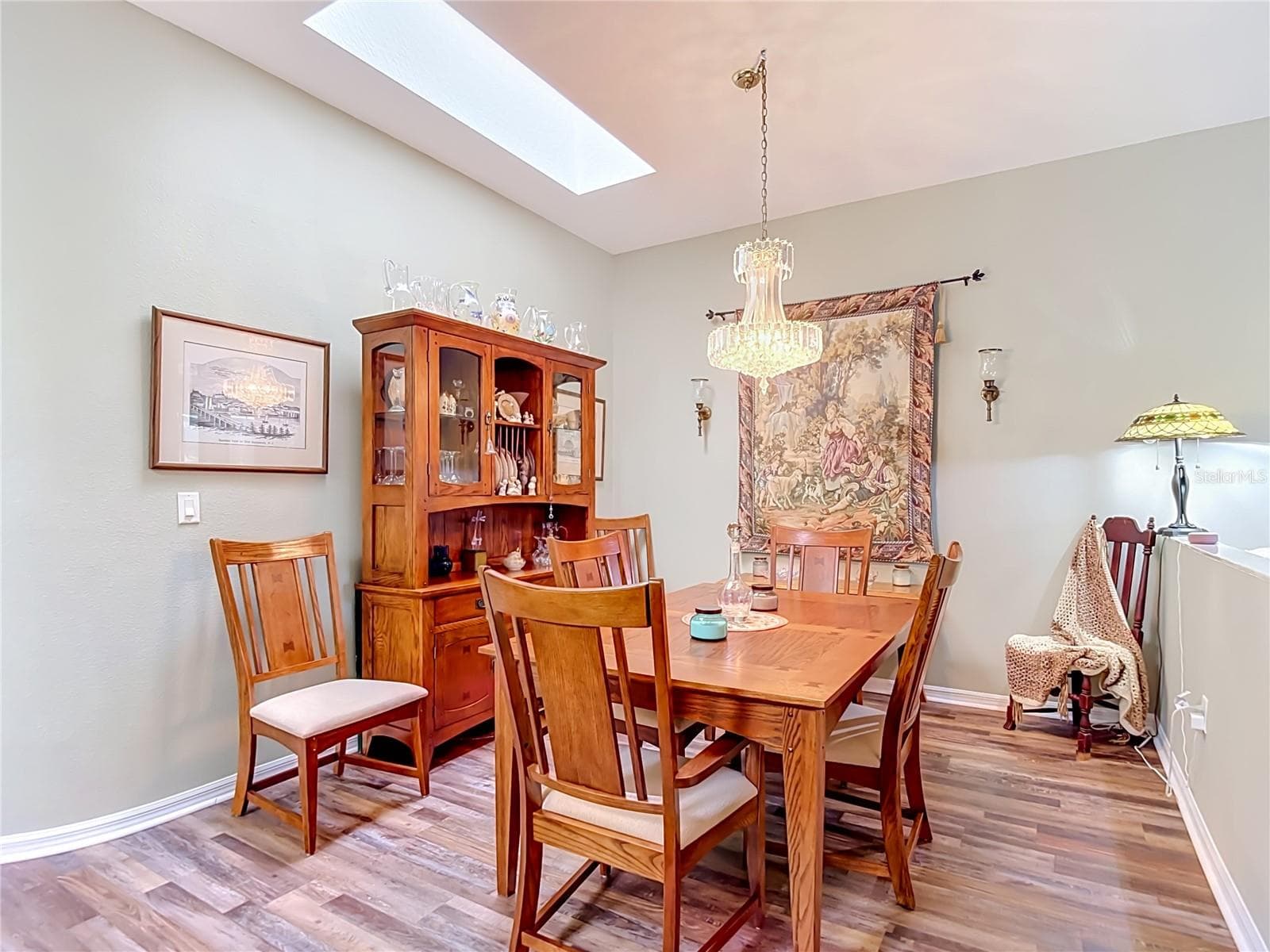 Plenty of space for at least six. Room for dining hutch as well. You also have a second skylight for that natural lighting. - 13424 NORMAN CIR, HUDSON