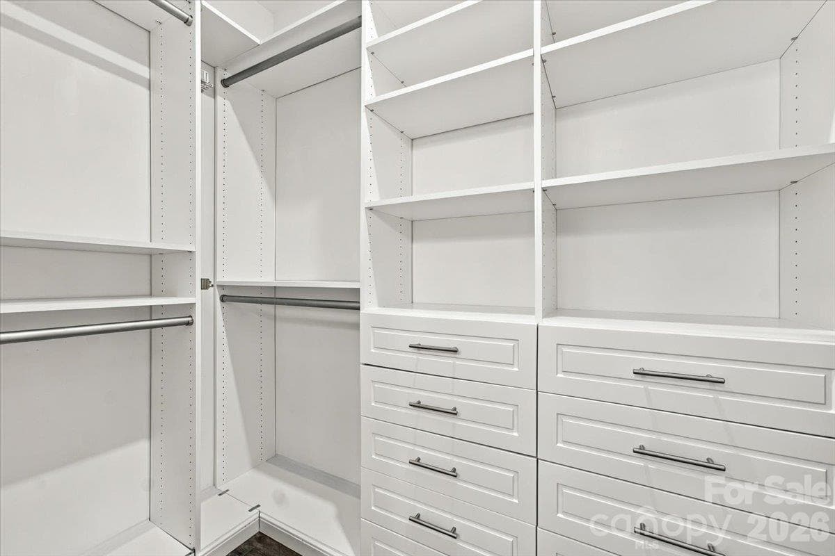 Primary closet with built ins - 24550 Blue Heron Circle, Lancaster