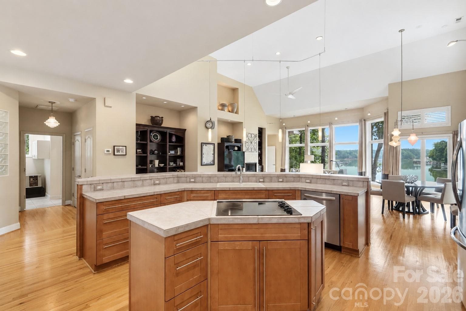 Seamless flow across an open floor plan designed for entertaining - 1075 Lakefront Woods Drive, Belmont
