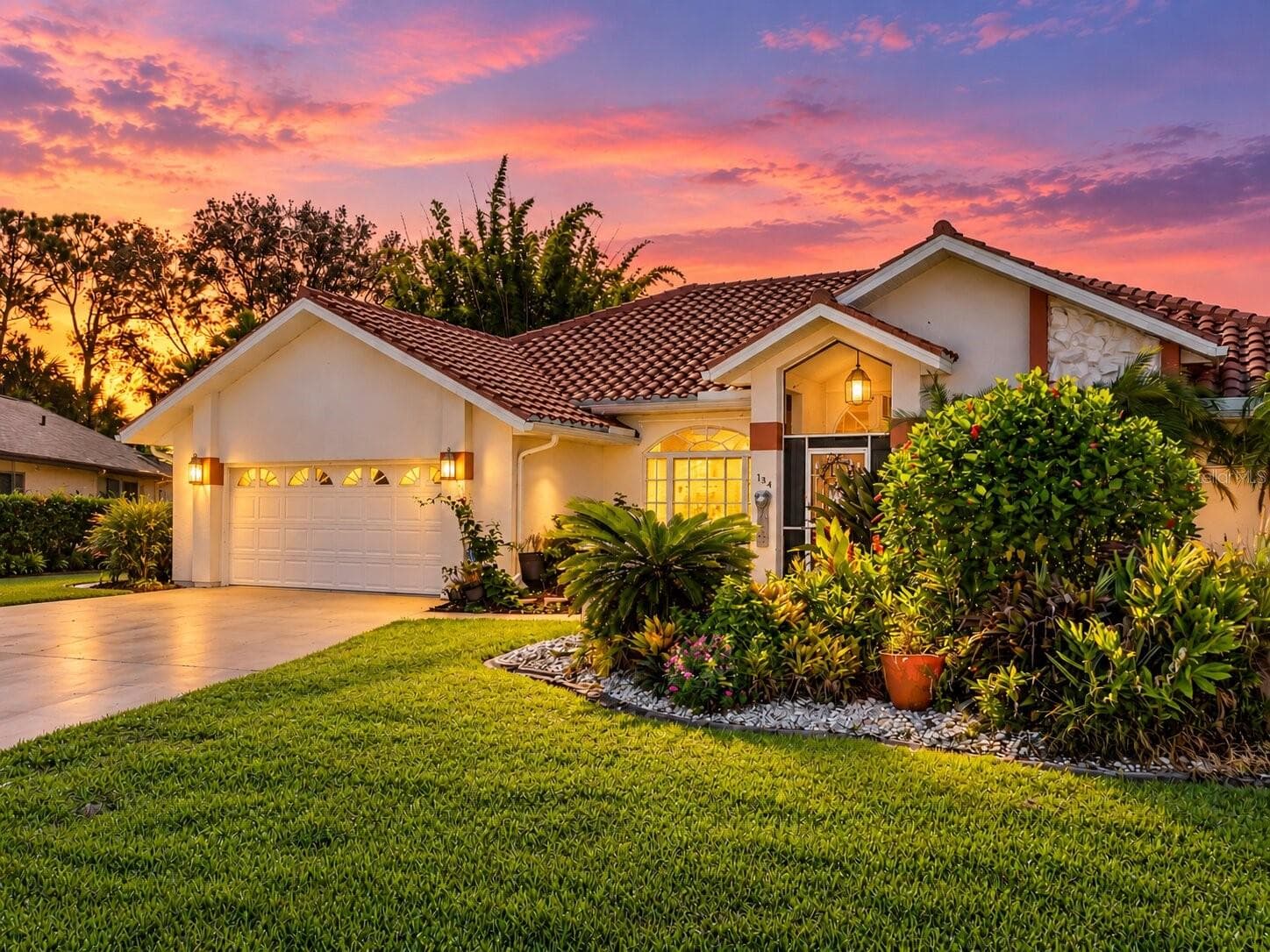 FrontExterior_134TocopillaStreet_PuntaGorda_CurbAppeal_Twilight.jpg - 134 TOCOPILLA ST, PUNTA GORDA