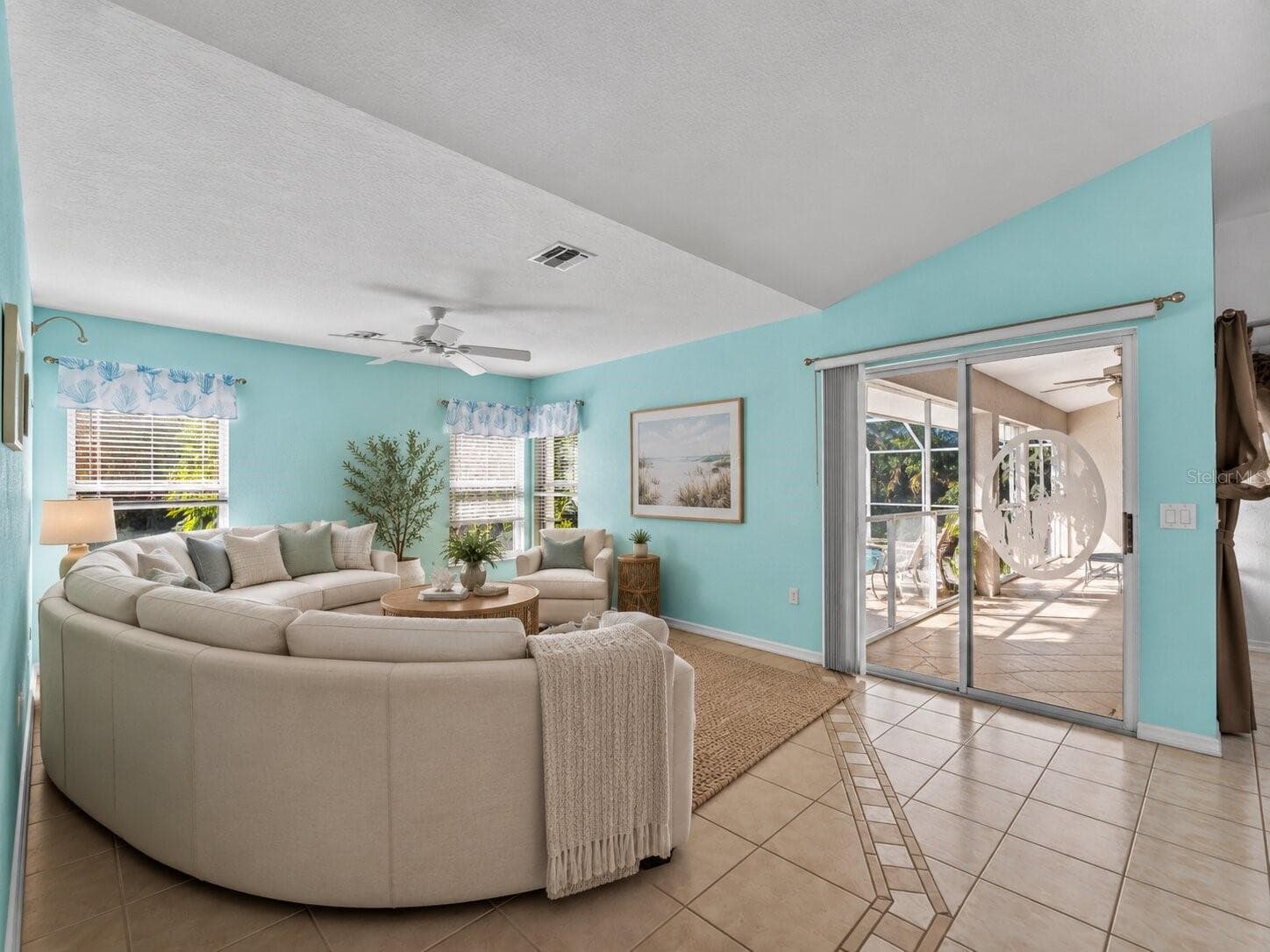(Staged) FamilyRoom_134TocopillaStreet_PuntaGorda_OpenConcept_SliderView.jpg - 134 TOCOPILLA ST, PUNTA GORDA