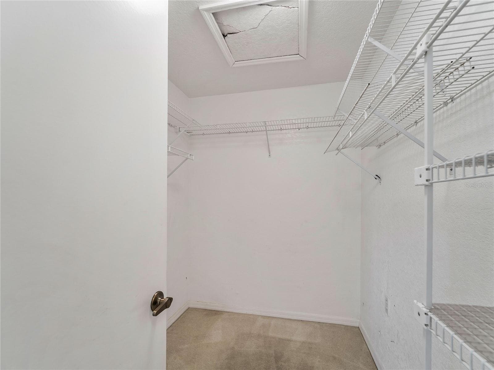WalkInCloset_134TocopillaStreet_PuntaGorda_BuiltInShelving_Corner.jpg - 134 TOCOPILLA ST, PUNTA GORDA