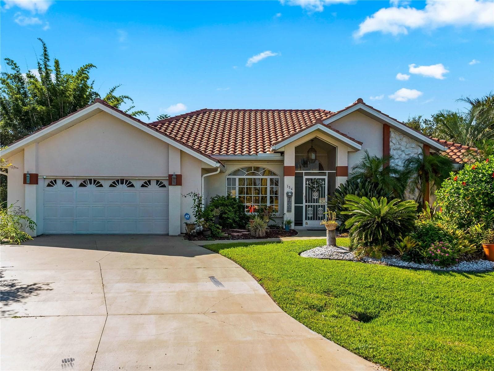 FrontExterior_134TocopillaStreet_PuntaGorda_CurbAppeal_Daylight.jpg - 134 TOCOPILLA ST, PUNTA GORDA