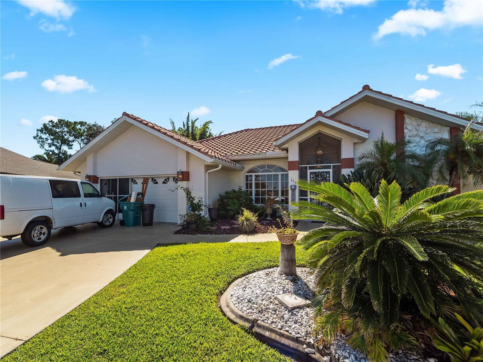 FrontExterior_134TocopillaStreet_PuntaGorda_TropicalLandscaping_Corner.jpg - 134 TOCOPILLA ST, PUNTA GORDA