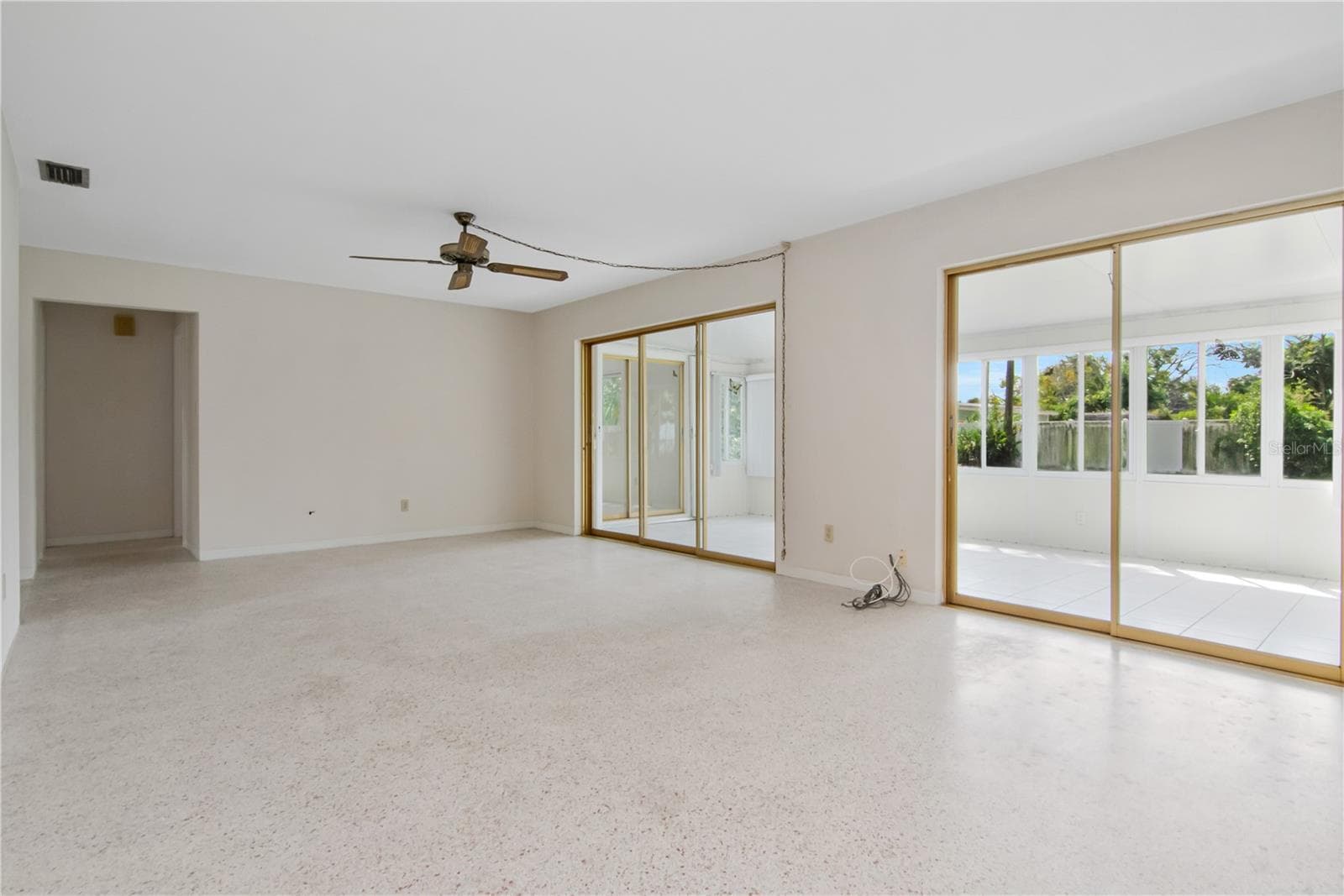 Lots of natural light from sliders - 4330 20TH AVE N, ST PETERSBURG