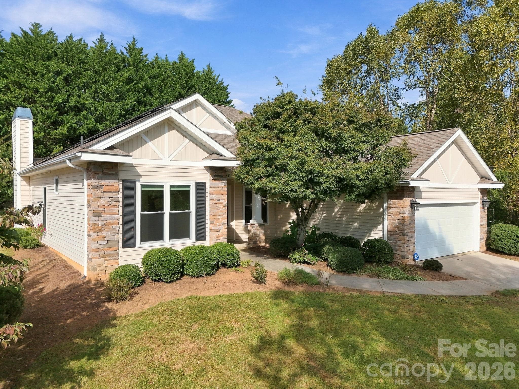 beautifully manicured front yard - 57 Talon Trail Lane, Etowah
