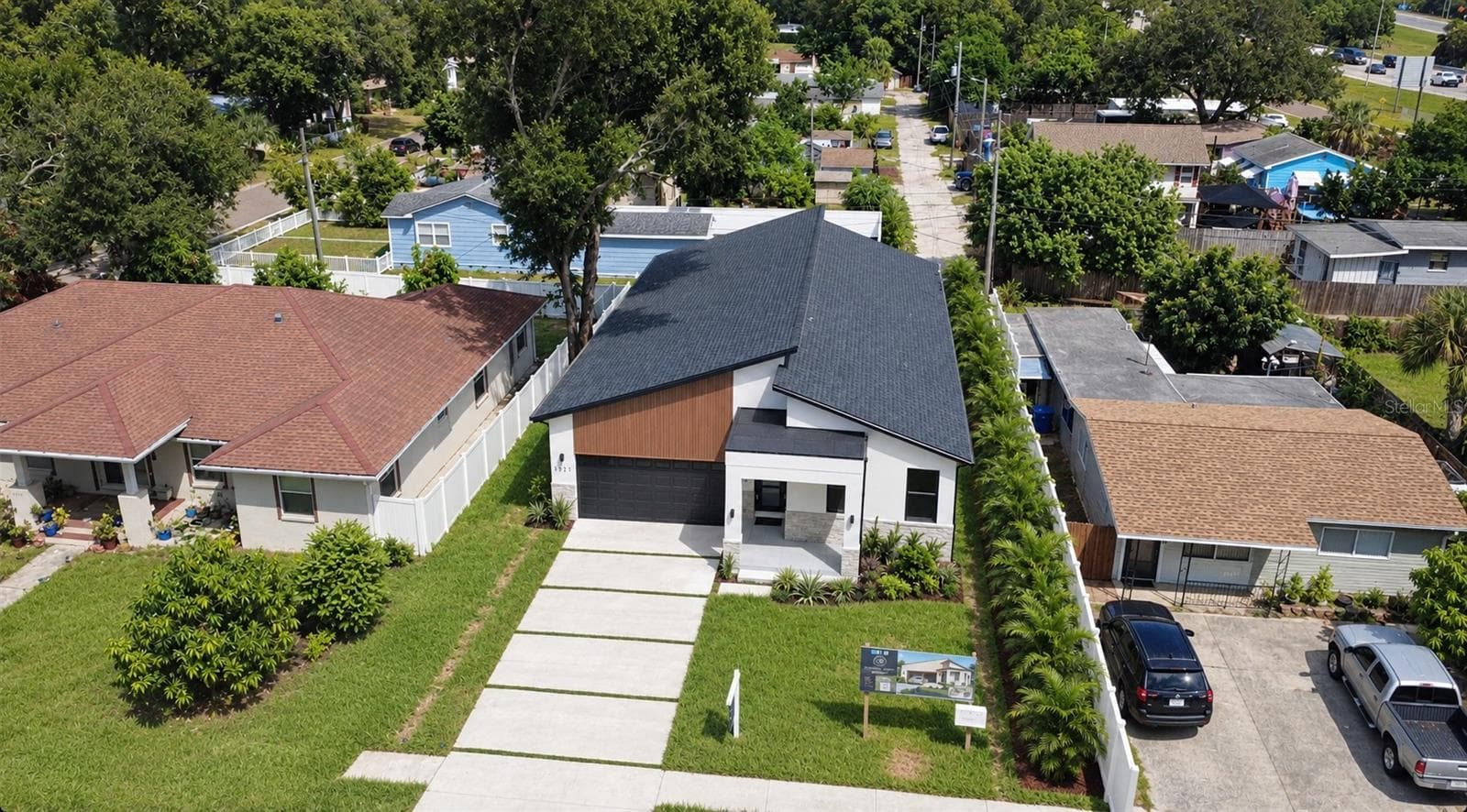 Virtual rendering: seller-offered privacy landscaping. - 2227 32ND AVE N, ST PETERSBURG