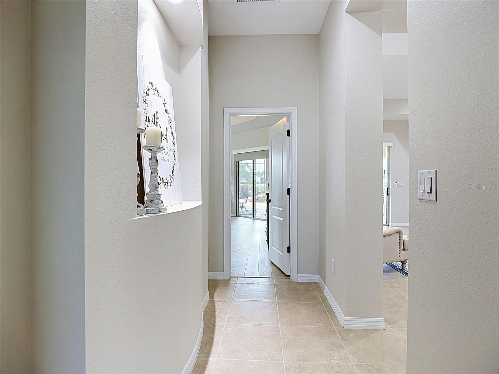 Hallway to Primary Suite - 17014 E 2ND AVE, BRADENTON