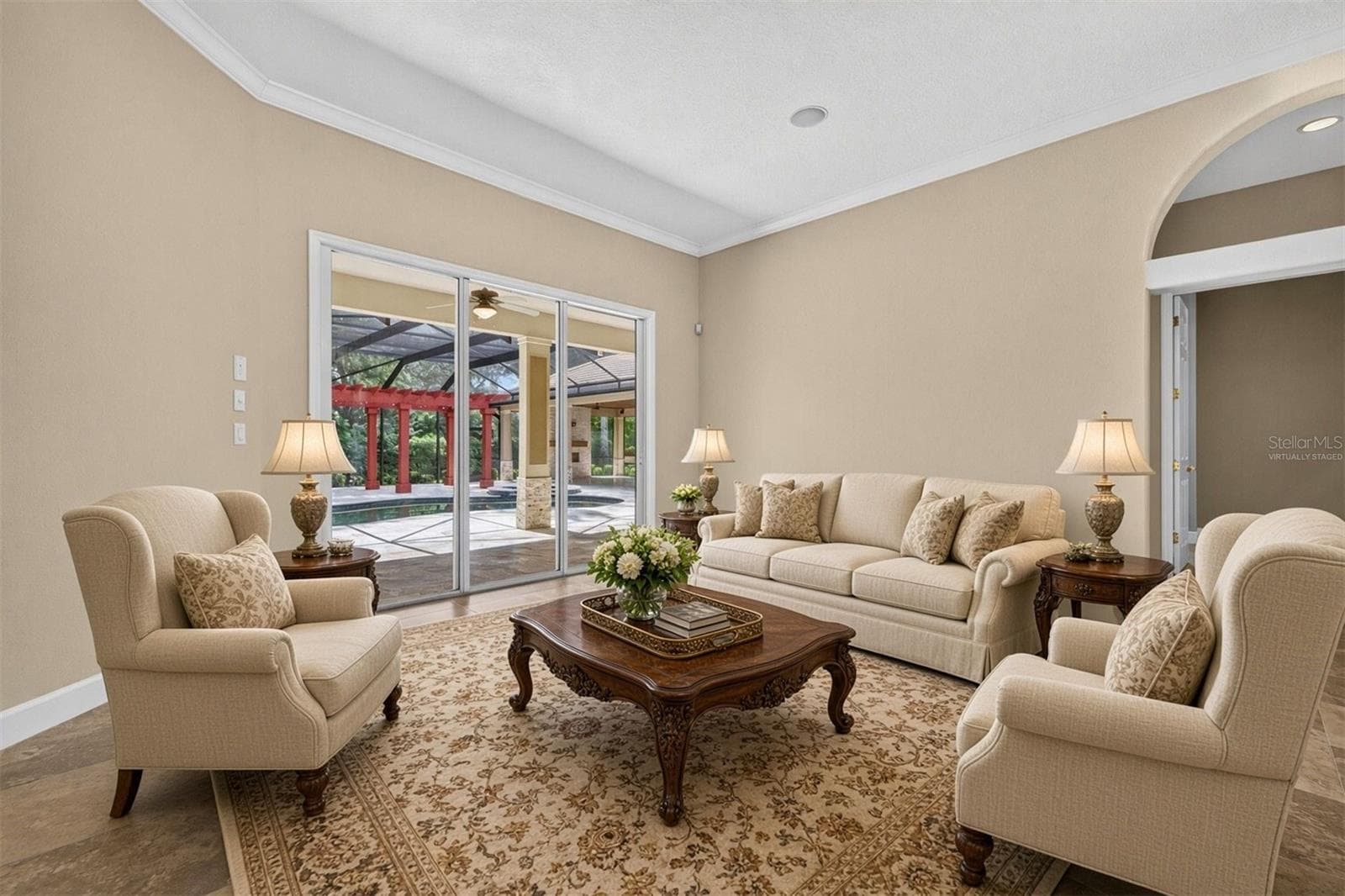Virtually staged living room option 2 - 1516 CANOPY OAKS BLVD, PALM HARBOR