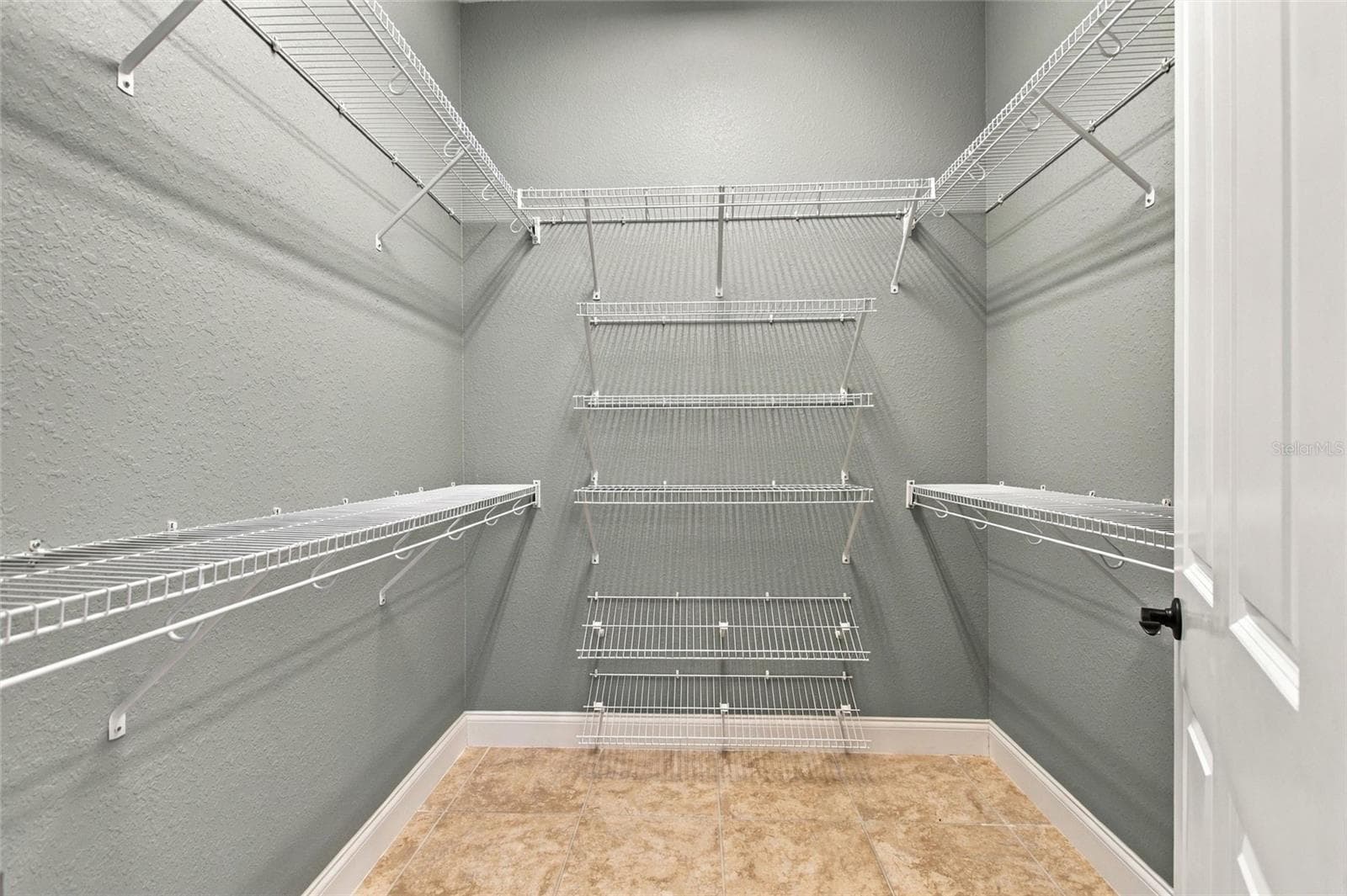 Walk in closet - 335 CRUISERS DR, POLK CITY