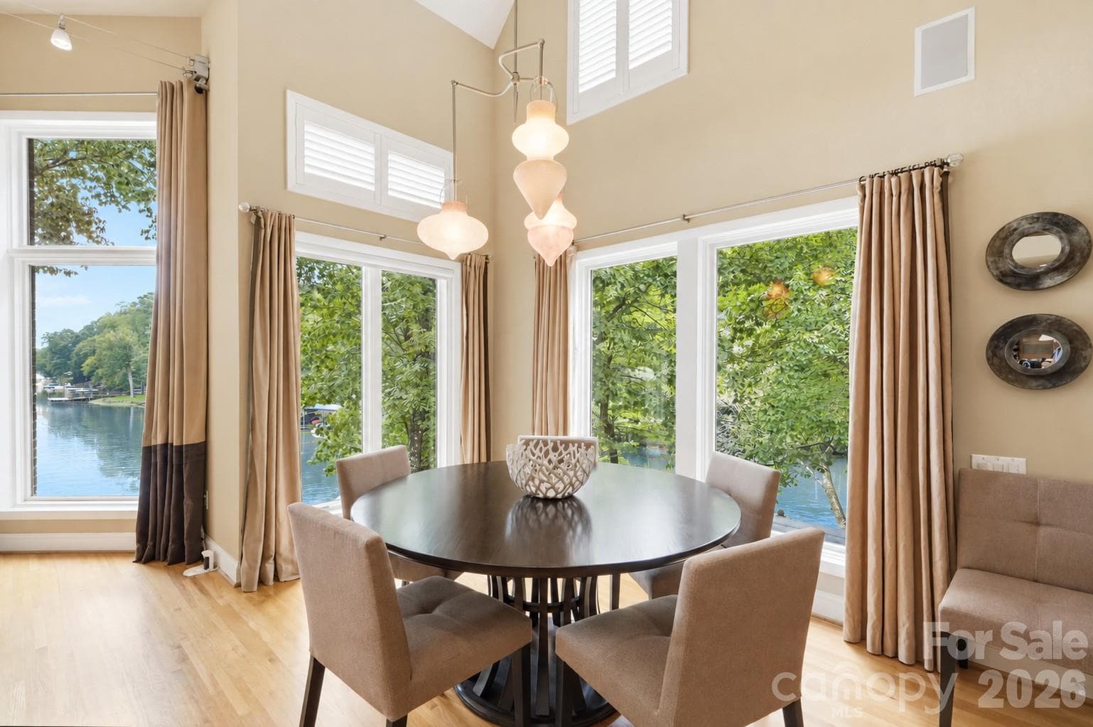 Dining area with custom Italian glass fixtures - 1075 Lakefront Woods Drive, Belmont
