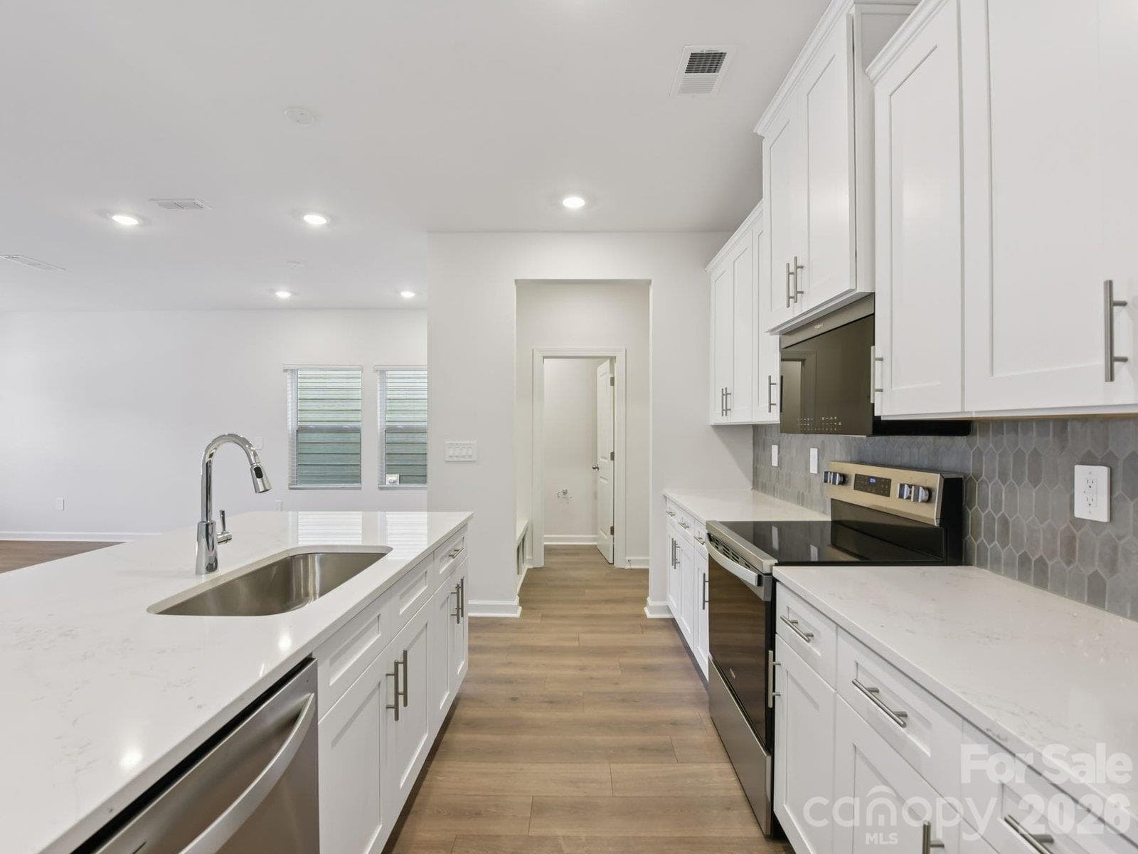Photos are not of the actual home, but are photos of the builder home with same floorplan with similar interior finishes. - 7293 Yardley Street, Gastonia