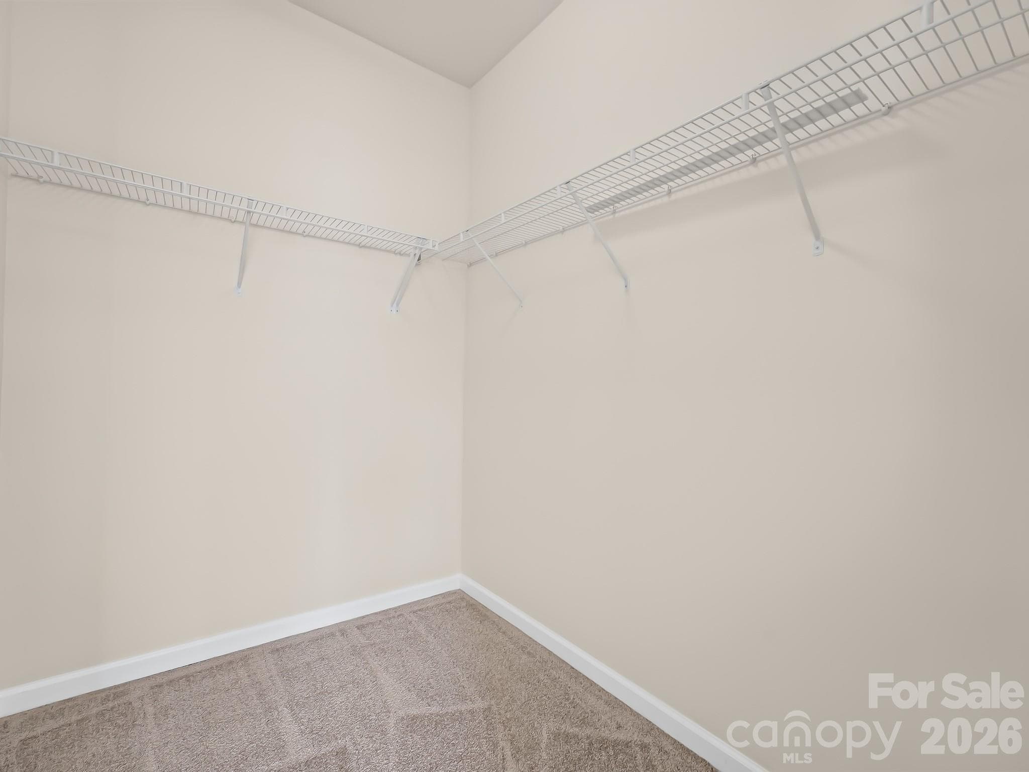 Largest of two closets in the primary suite - 15 Chowan Drive, Fletcher