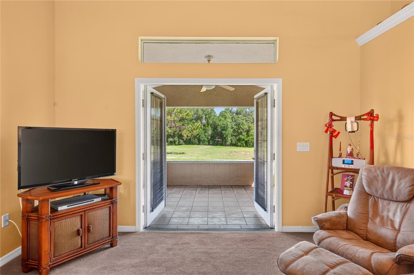 French doors to lanai - 90 GOLFVIEW CIR, UMATILLA