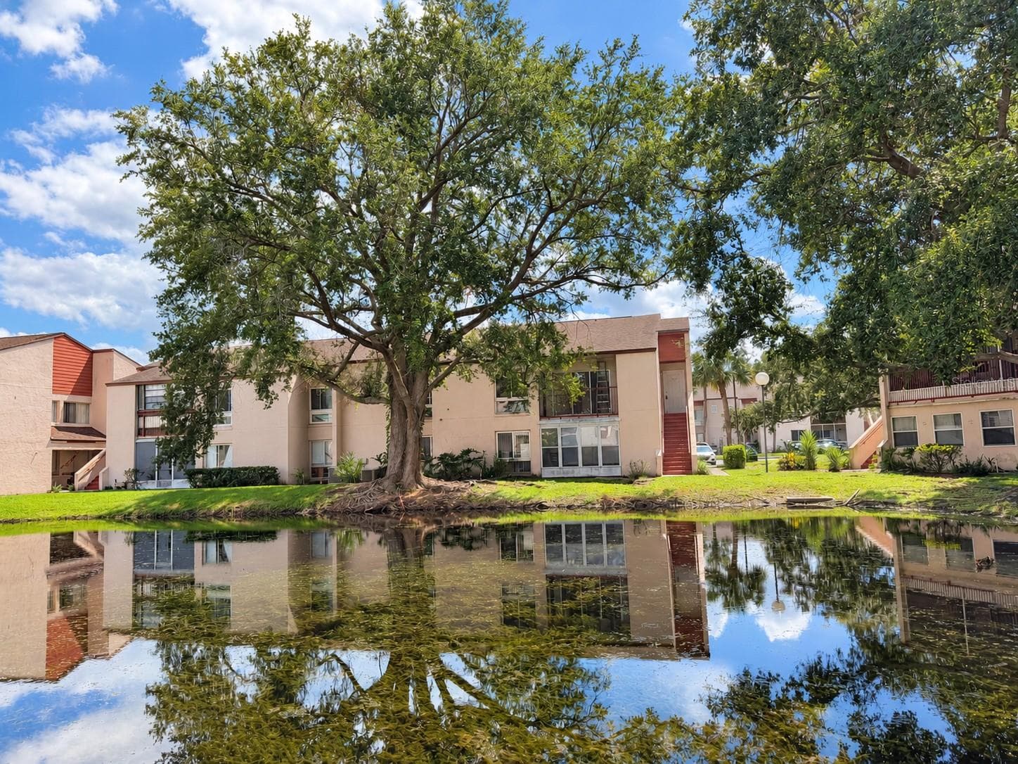 Nice view of #2527 stairs and balcony, seen from across the pond. - 2527 CITRUS CLUB LN #3904, ORLANDO