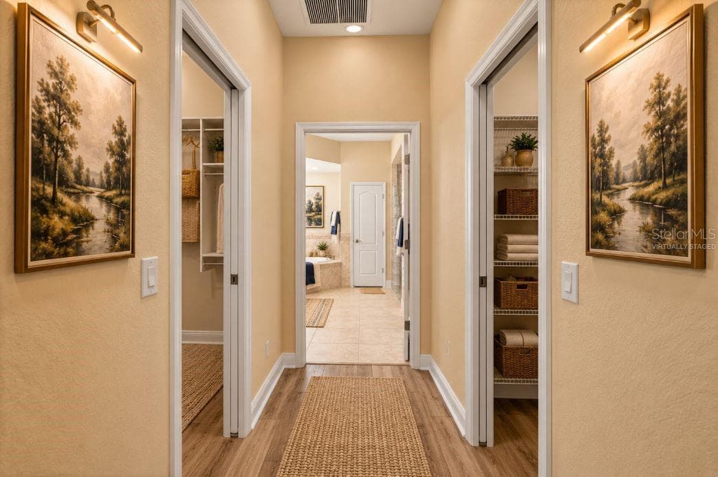 Virtually staged hallway master closets. - 1126 MIONA SHORES DR, THE VILLAGES