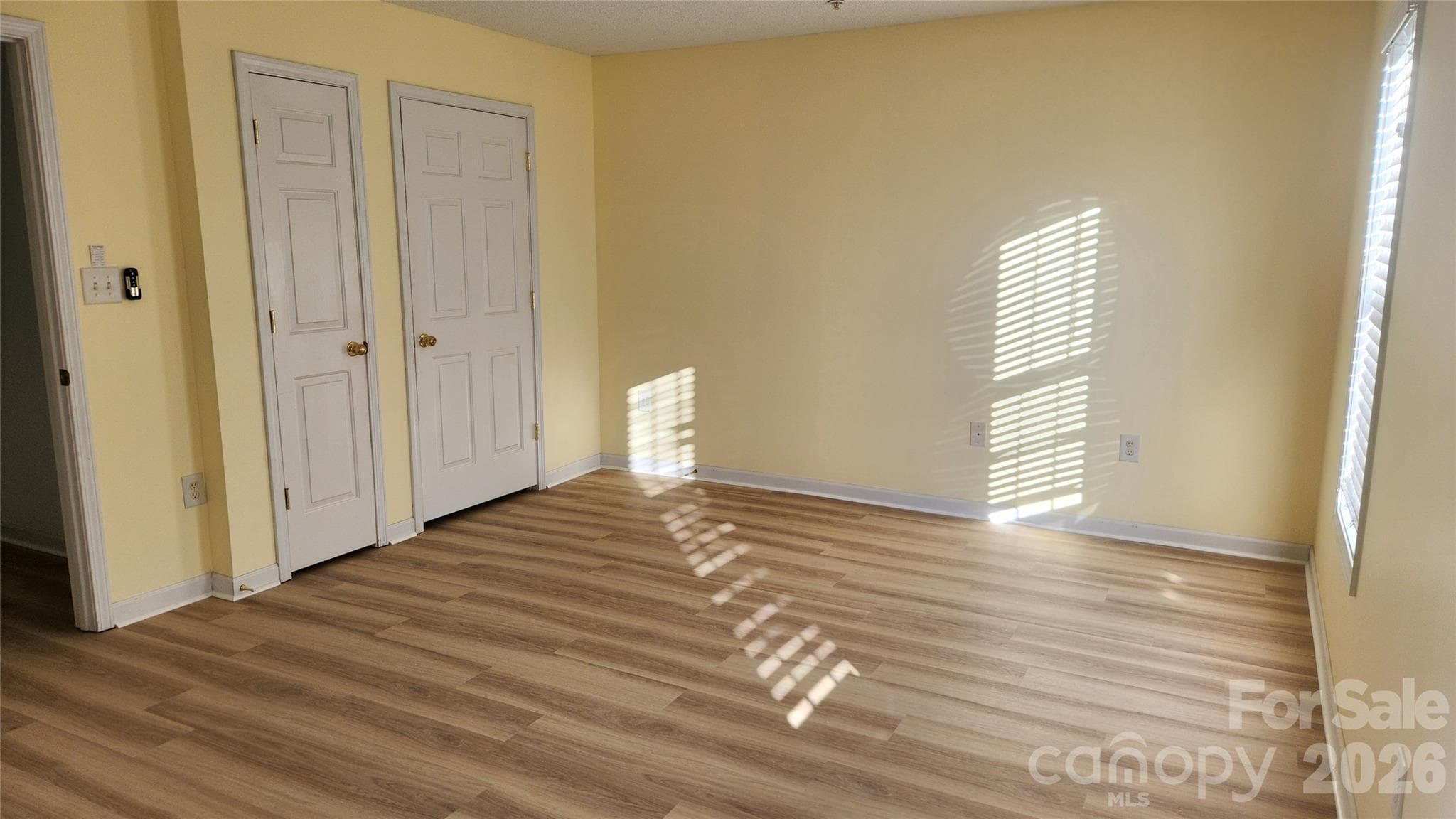 Bedroom #1 with afternoon sunlight - 110 Steam Engine Drive, Mooresville