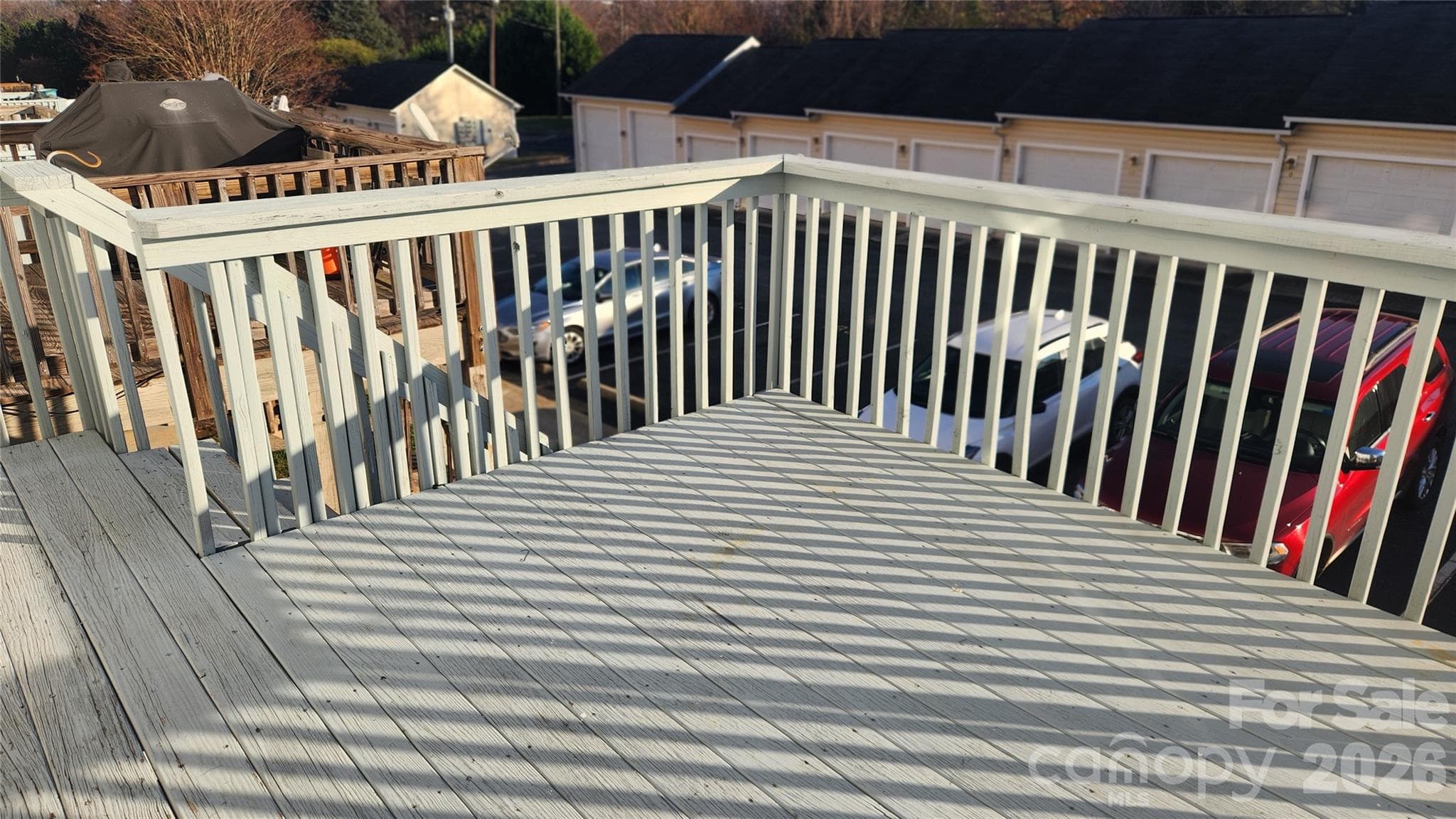 Deck and assigned parking space below - 110 Steam Engine Drive, Mooresville