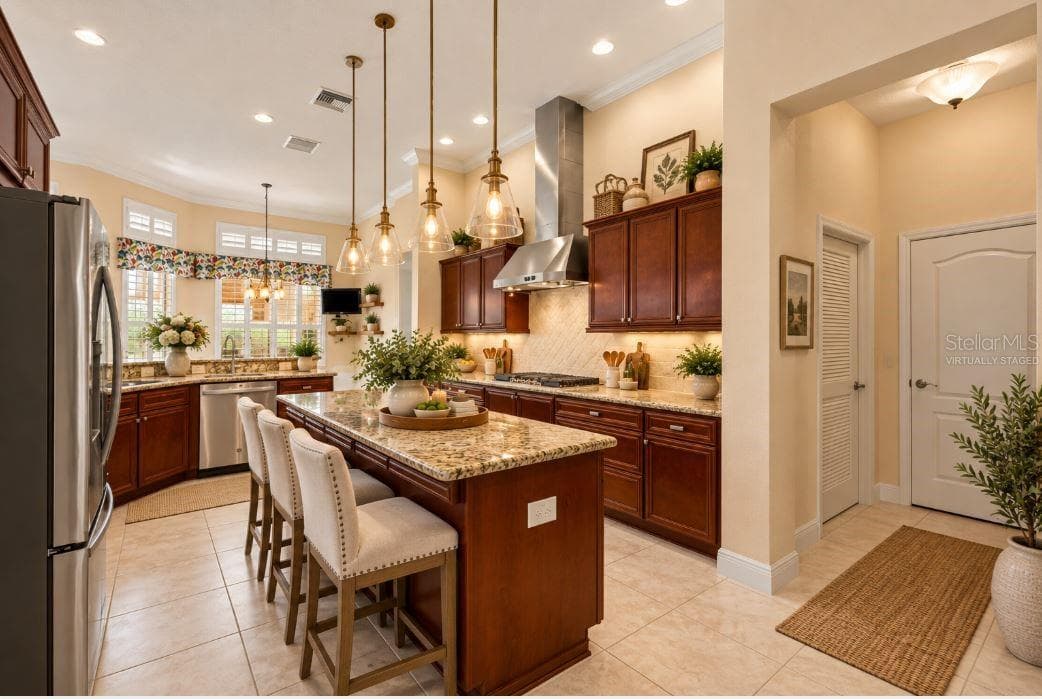 Virtually staged a gourmet kitchen. - 1126 MIONA SHORES DR, THE VILLAGES