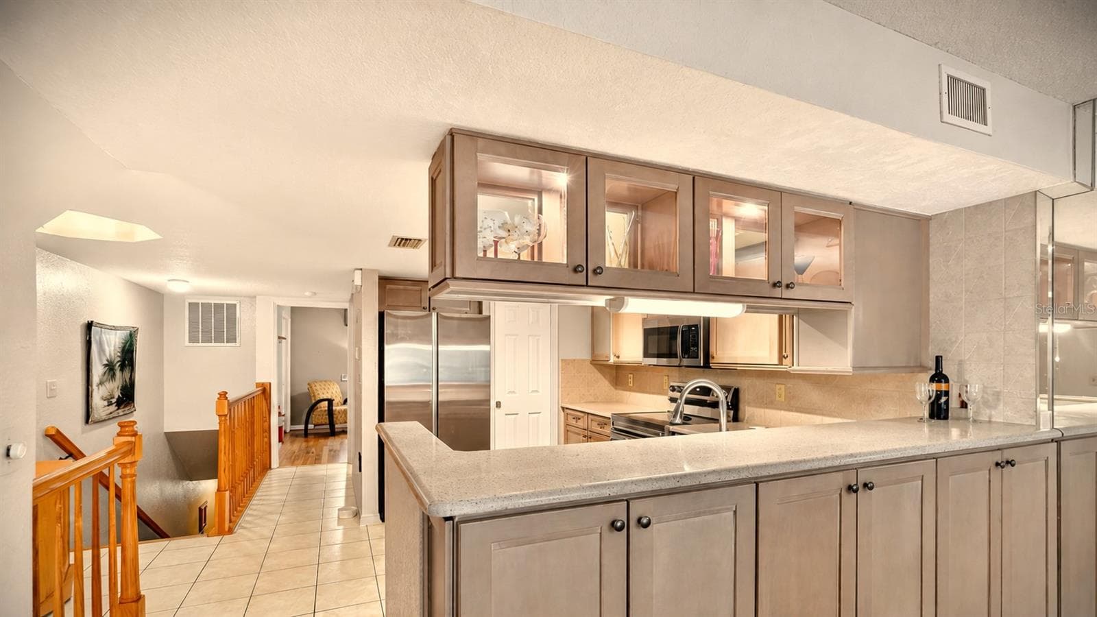 Extra cabinetry adds valuable storage beyond the typical Tara Cay layout - 14879 SEMINOLE TRL, SEMINOLE