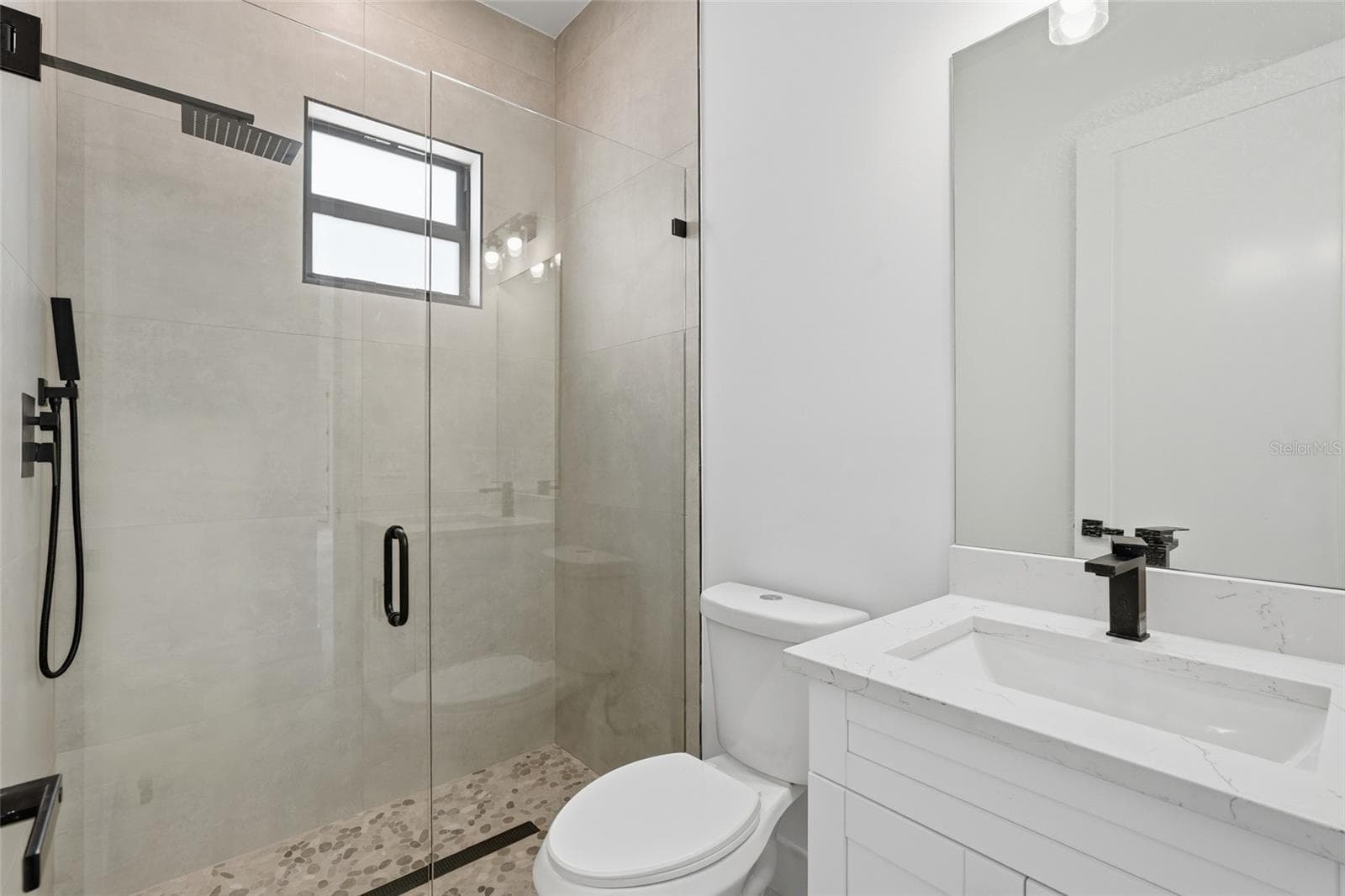 BATHROOM - 227 NE 15TH ST, CAPE CORAL