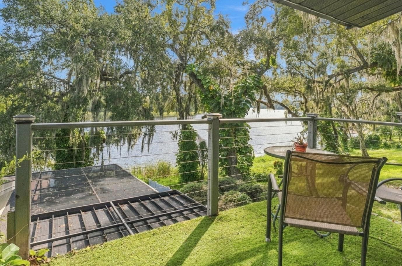 Balcony off primary with stairs down to pool! - 3006 RIVER GROVE DR, TAMPA