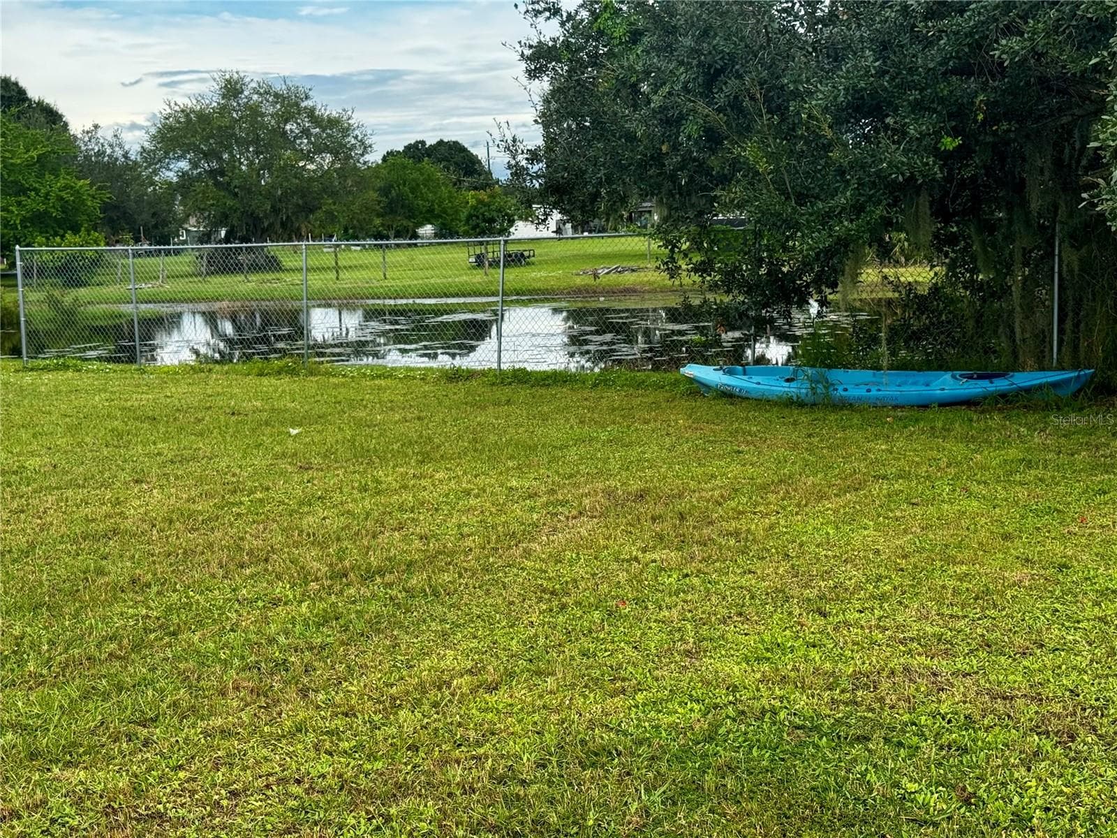 Backyard view of pond - 5912 33RD DR E, PALMETTO
