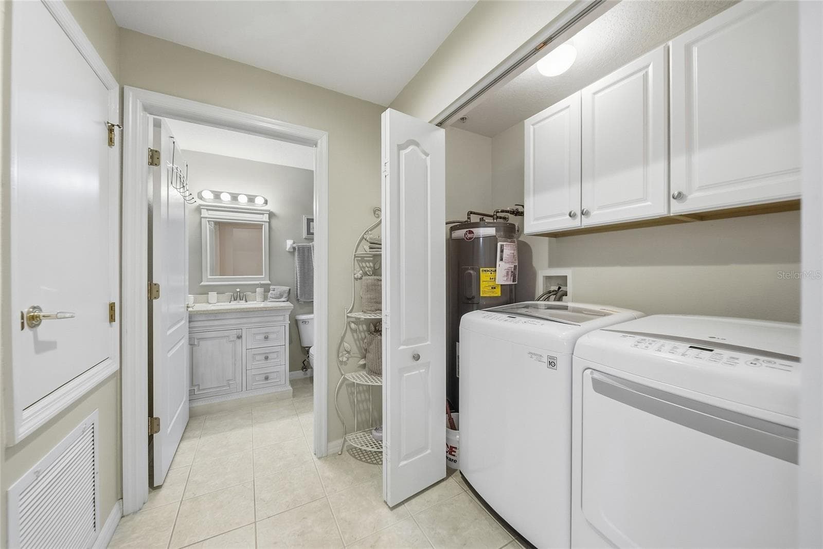 Hallway with in unit laundry - 5320 HYLAND HILLS AVE #2222, SARASOTA