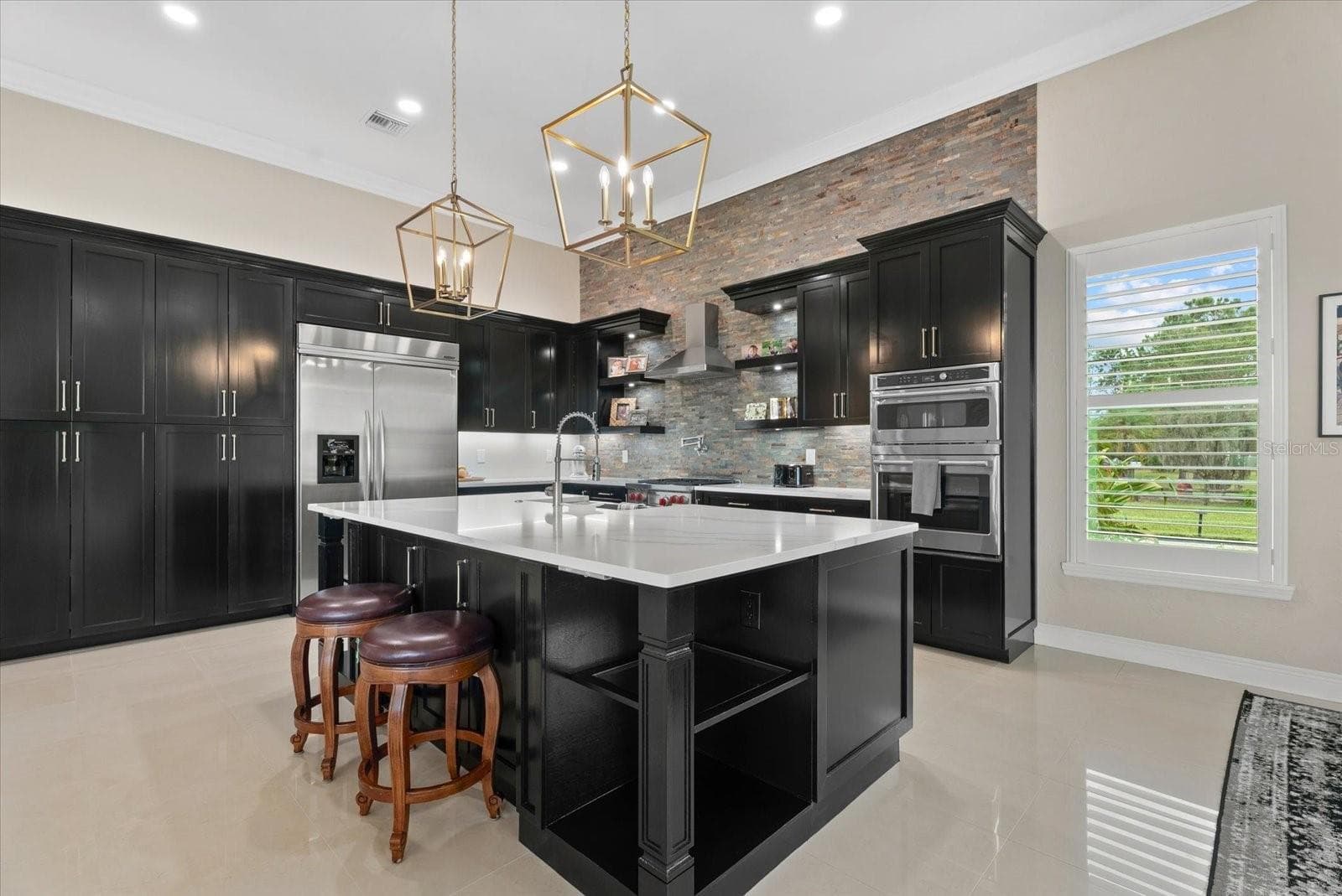 The is a wealth of counter space and enclosed cabinets in the freshly updated kitchen - 520 RYE RD NE, BRADENTON