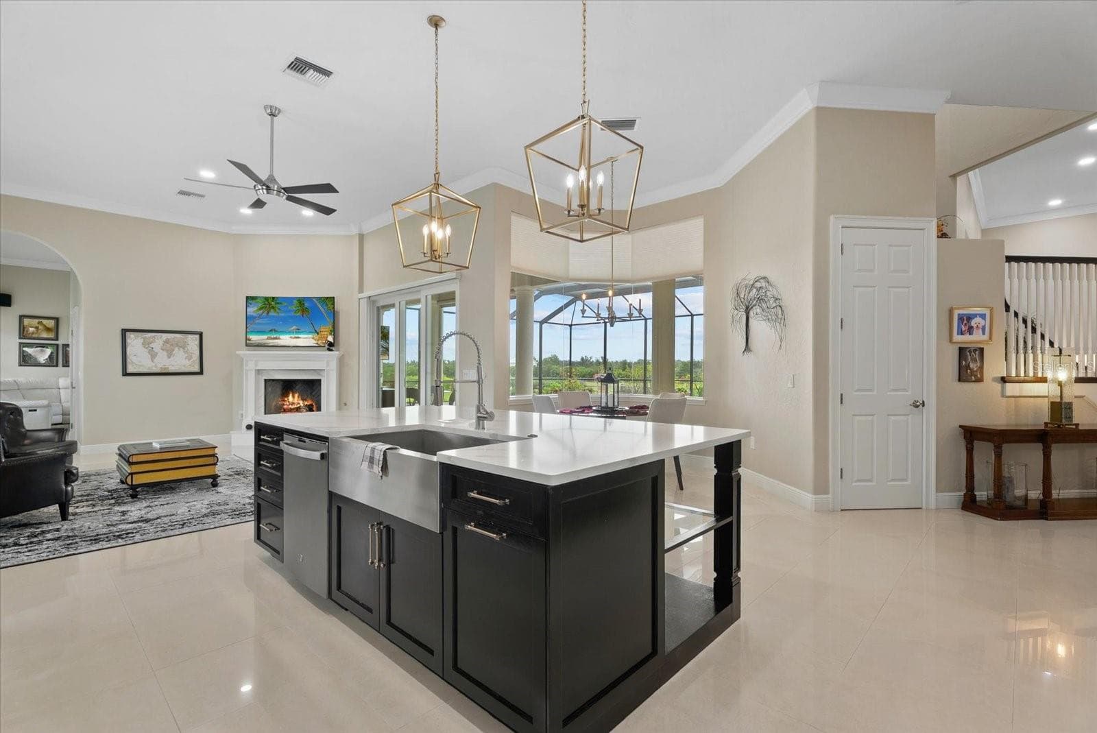 The walk in pantry door is shown and close to the kitchen island - 520 RYE RD NE, BRADENTON