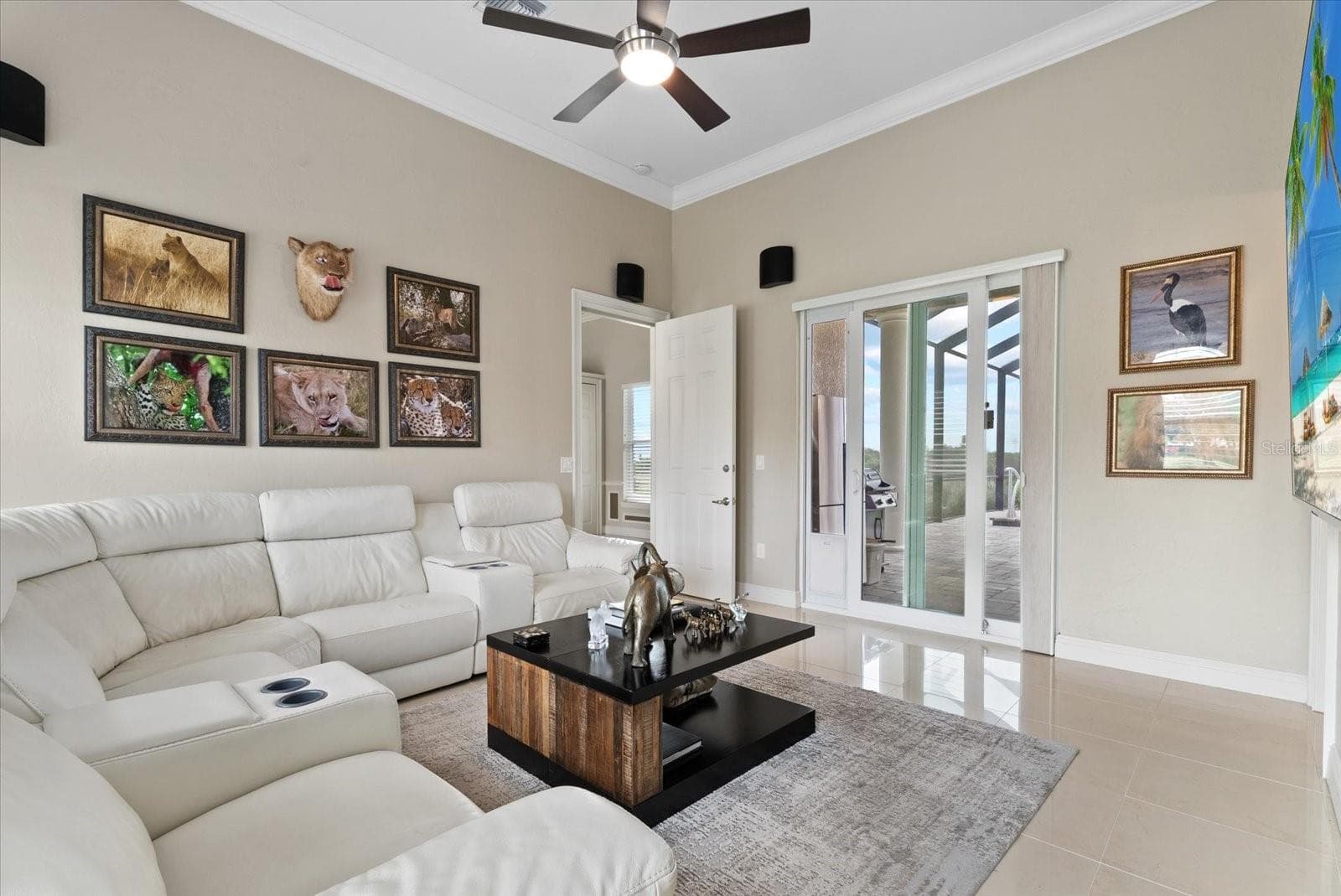 A short hallway from the family room leads to a media room - 520 RYE RD NE, BRADENTON