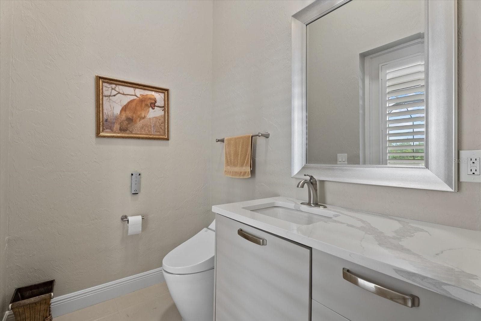 Half bath that leads to the pool deck - 520 RYE RD NE, BRADENTON