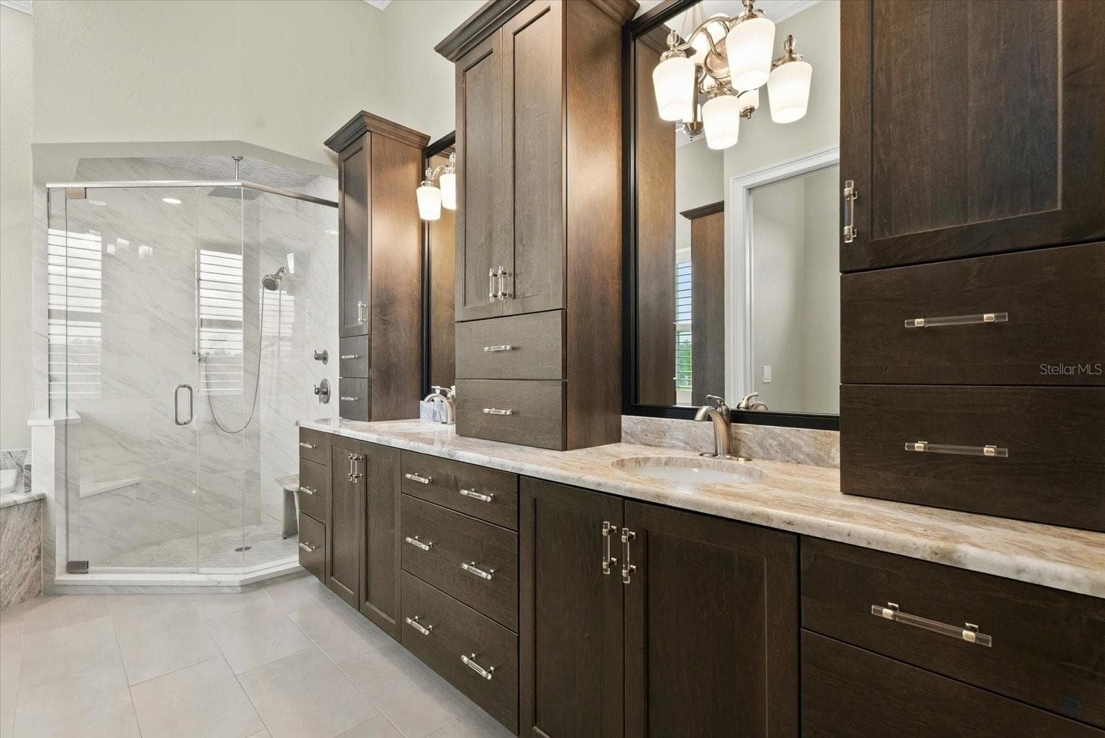 Storage, storage and more stoarage in the primary suite's ensuite bath - 520 RYE RD NE, BRADENTON